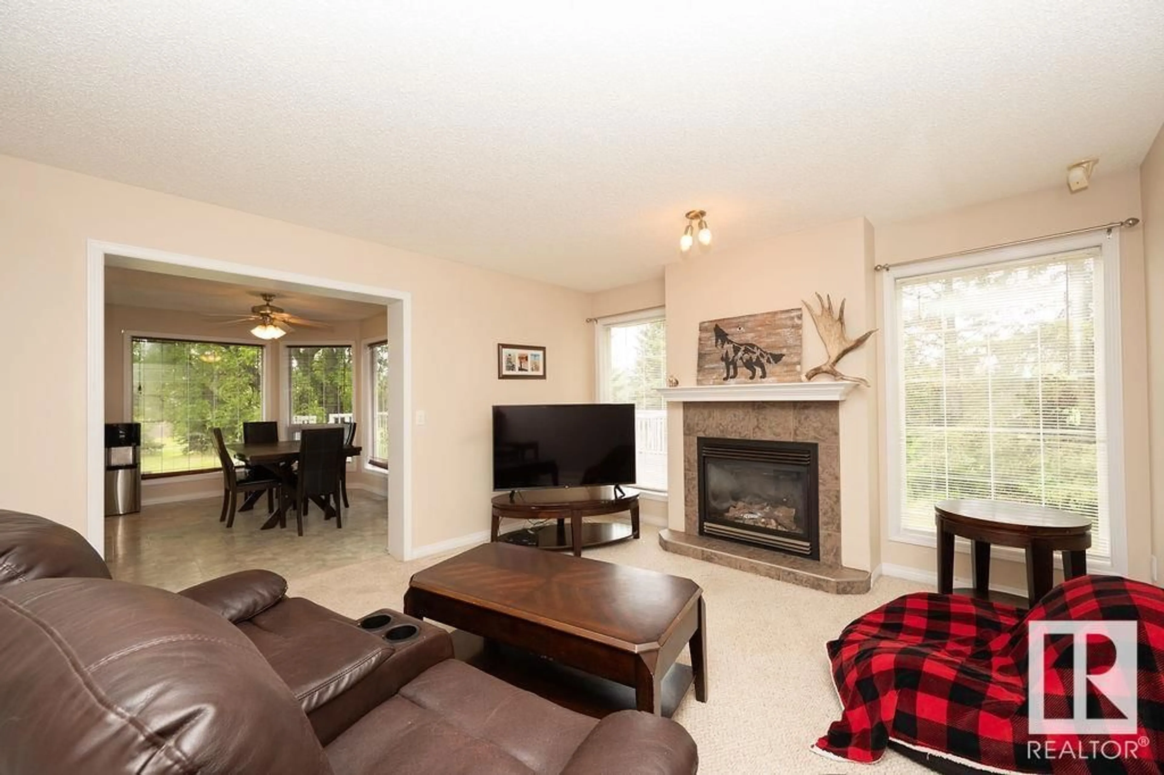 Living room with furniture, wood/laminate floor for 60319 RGE RD 252, Rural Westlock County Alberta T0G0P0