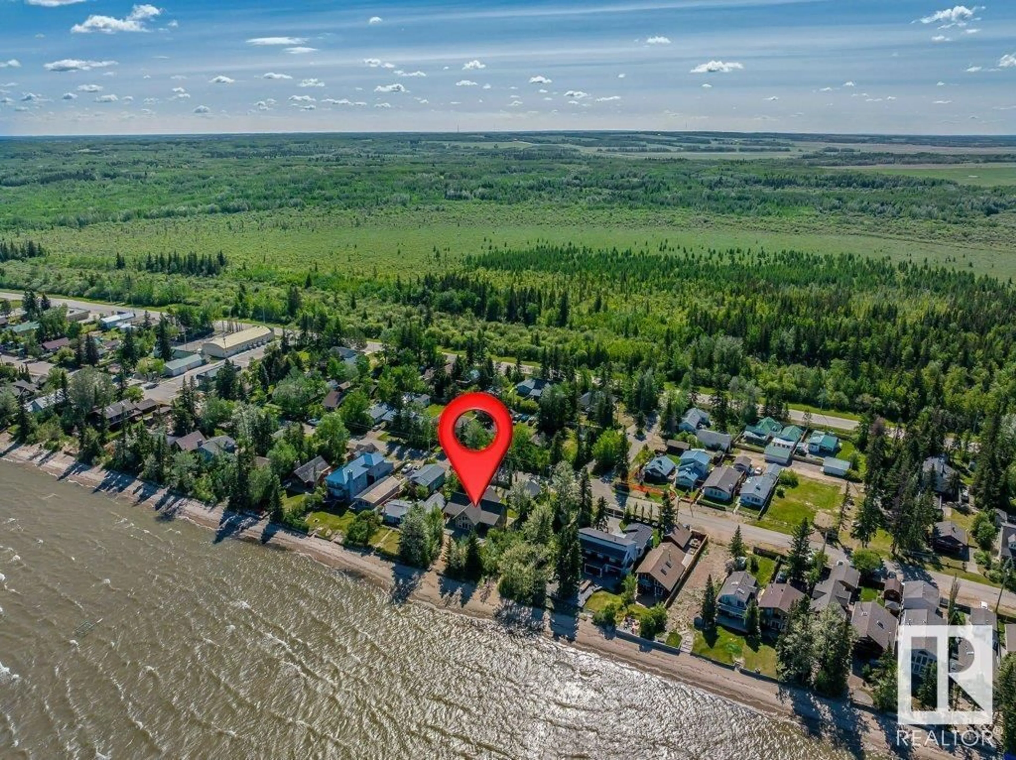 A pic from outside/outdoor area/front of a property/back of a property/a pic from drone, water/lake/river/ocean view for 719 1ST AVE, Rural Wetaskiwin County Alberta T0C2V0