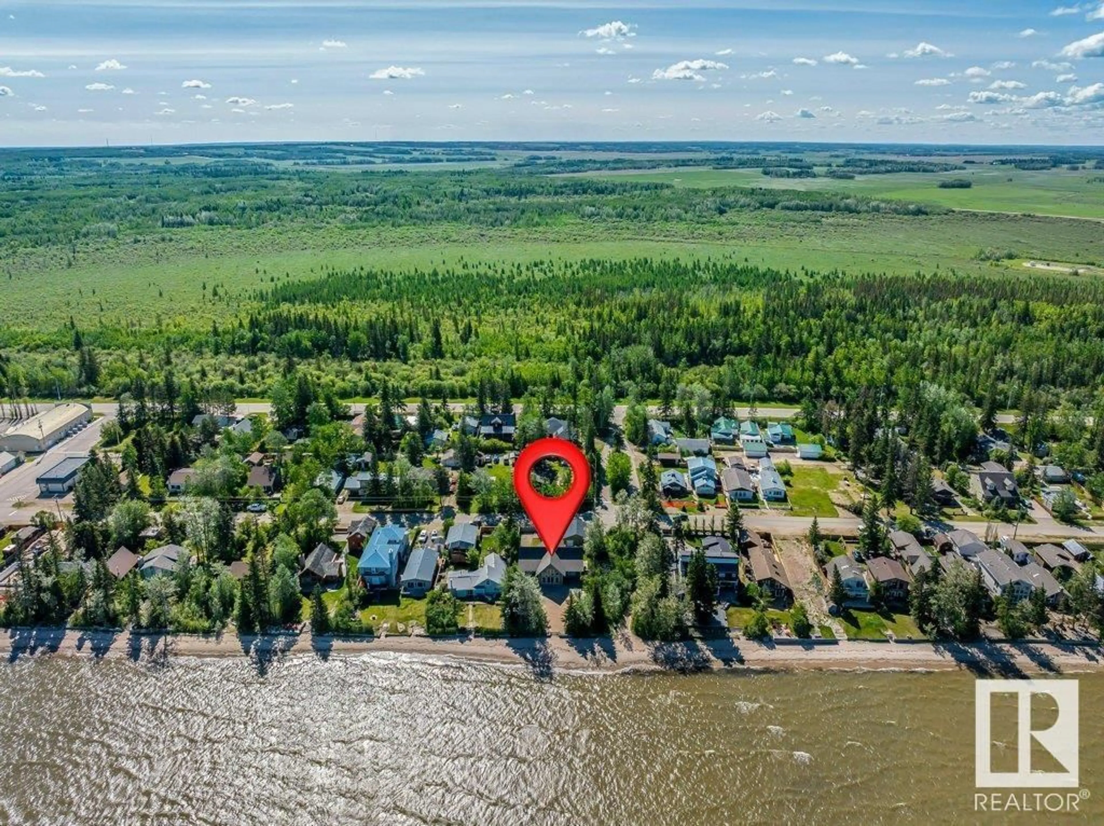 A pic from outside/outdoor area/front of a property/back of a property/a pic from drone, water/lake/river/ocean view for 719 1ST AVE, Rural Wetaskiwin County Alberta T0C2V0