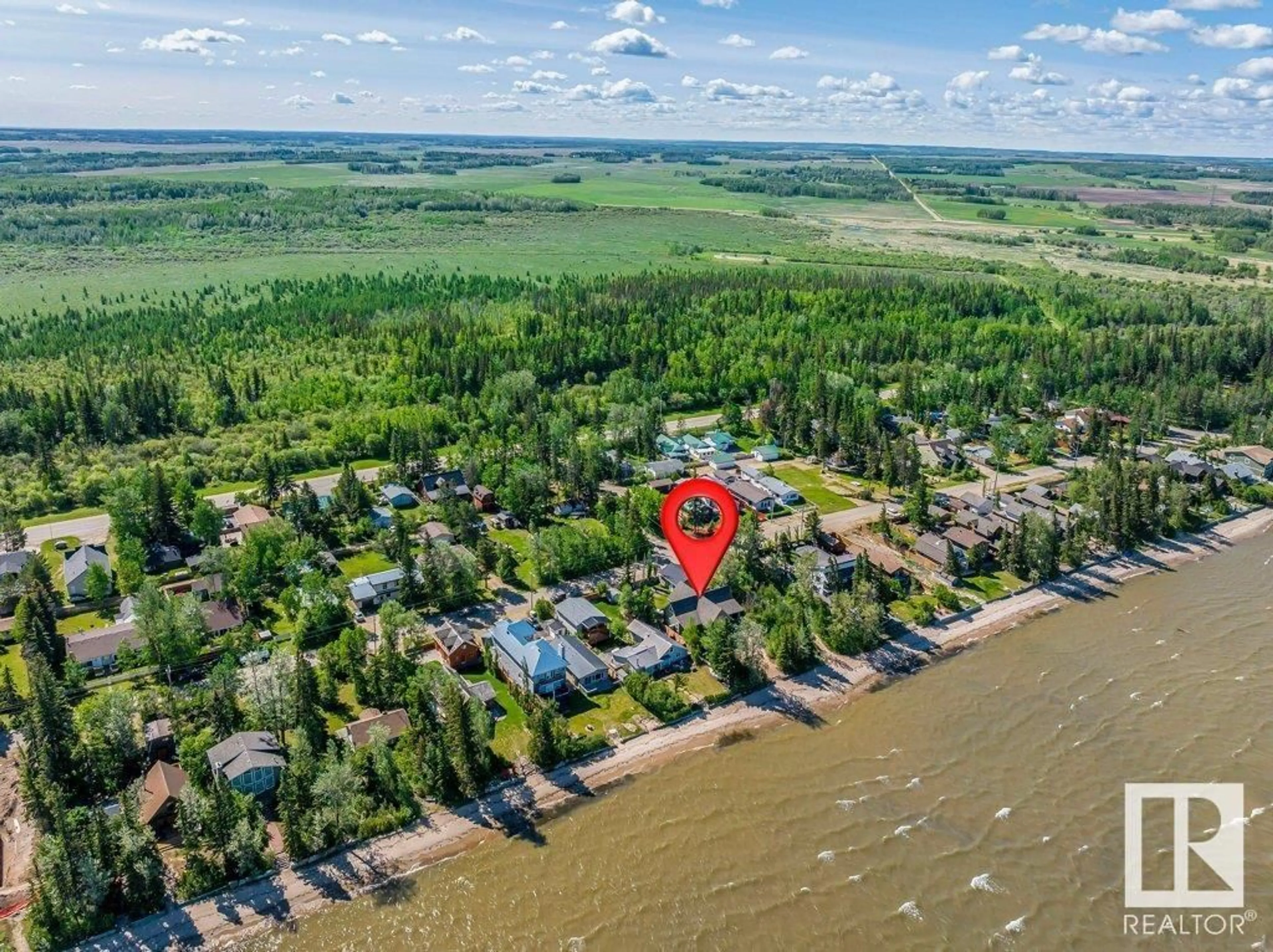 A pic from outside/outdoor area/front of a property/back of a property/a pic from drone, water/lake/river/ocean view for 719 1ST AVE, Rural Wetaskiwin County Alberta T0C2V0