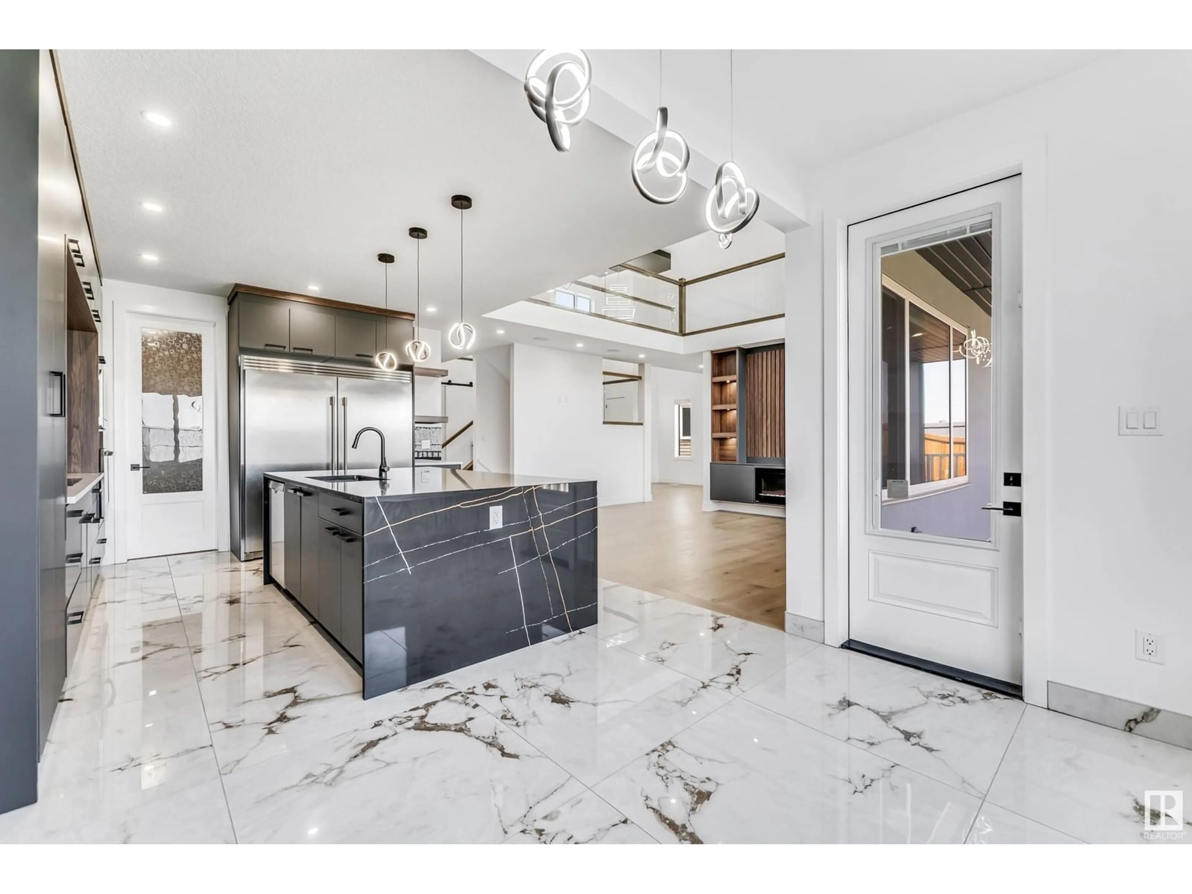 Open concept kitchen, ceramic/tile floor for 15003 10 ST, Edmonton Alberta T5Y4C8
