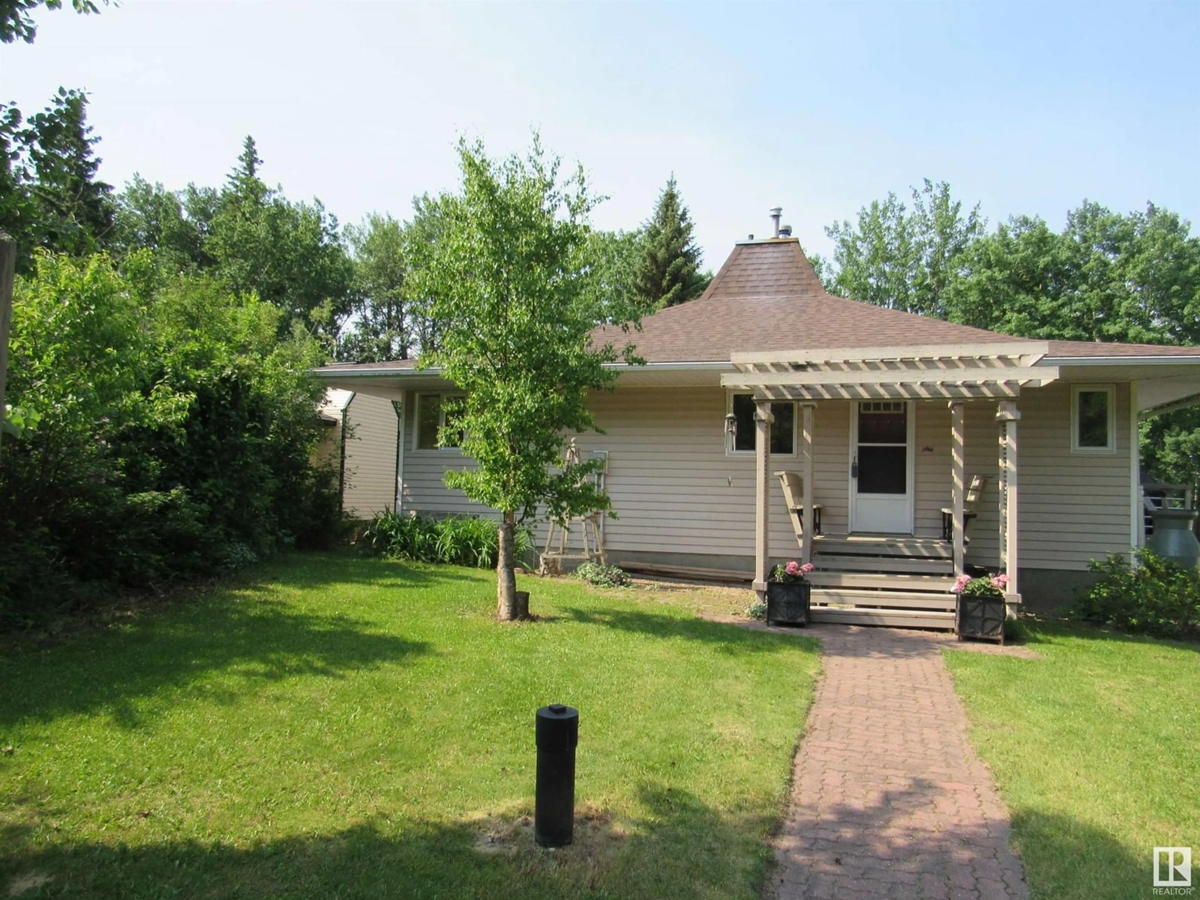 A pic from outside/outdoor area/front of a property/back of a property/a pic from drone, street for 225 - 5415 TWP RD 594, Rural Barrhead County Alberta T7N1N3