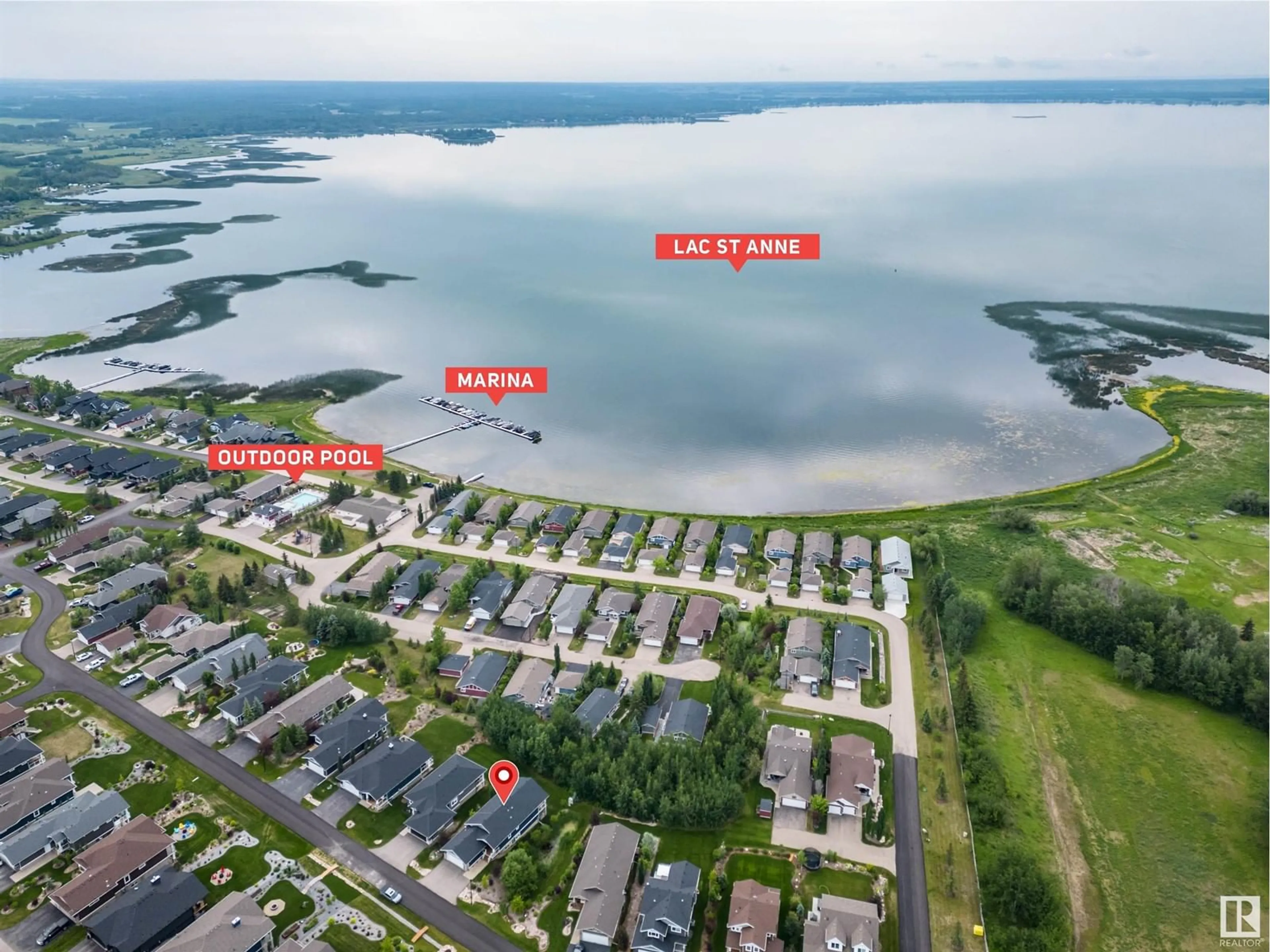 A pic from outside/outdoor area/front of a property/back of a property/a pic from drone, water/lake/river/ocean view for 55101 - 539 STE. ANNE TR, Rural Lac Ste. Anne County Alberta T0E1A1