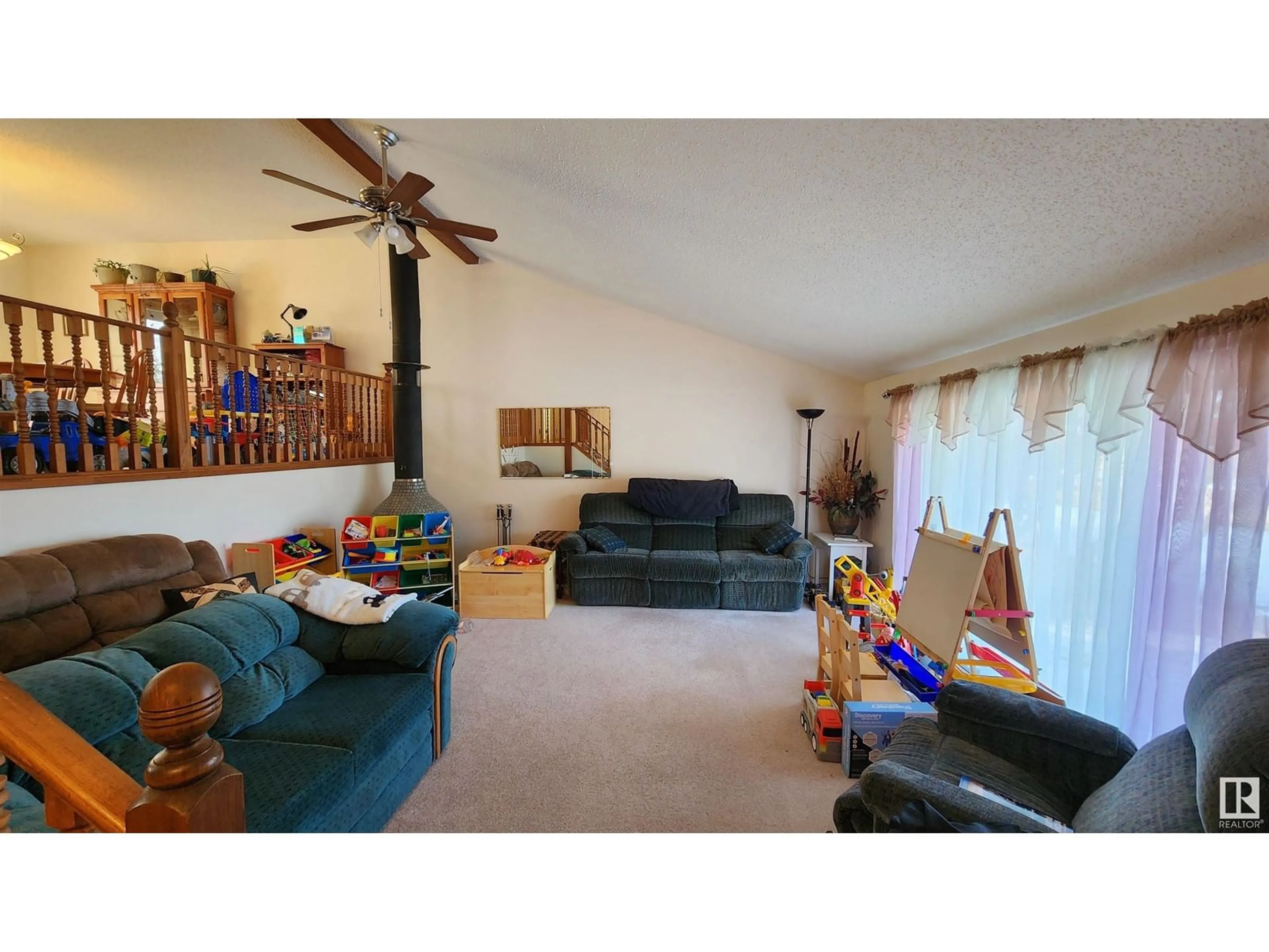 Living room with furniture, unknown for 5821 52 AV, Vermilion Alberta T9X1V7
