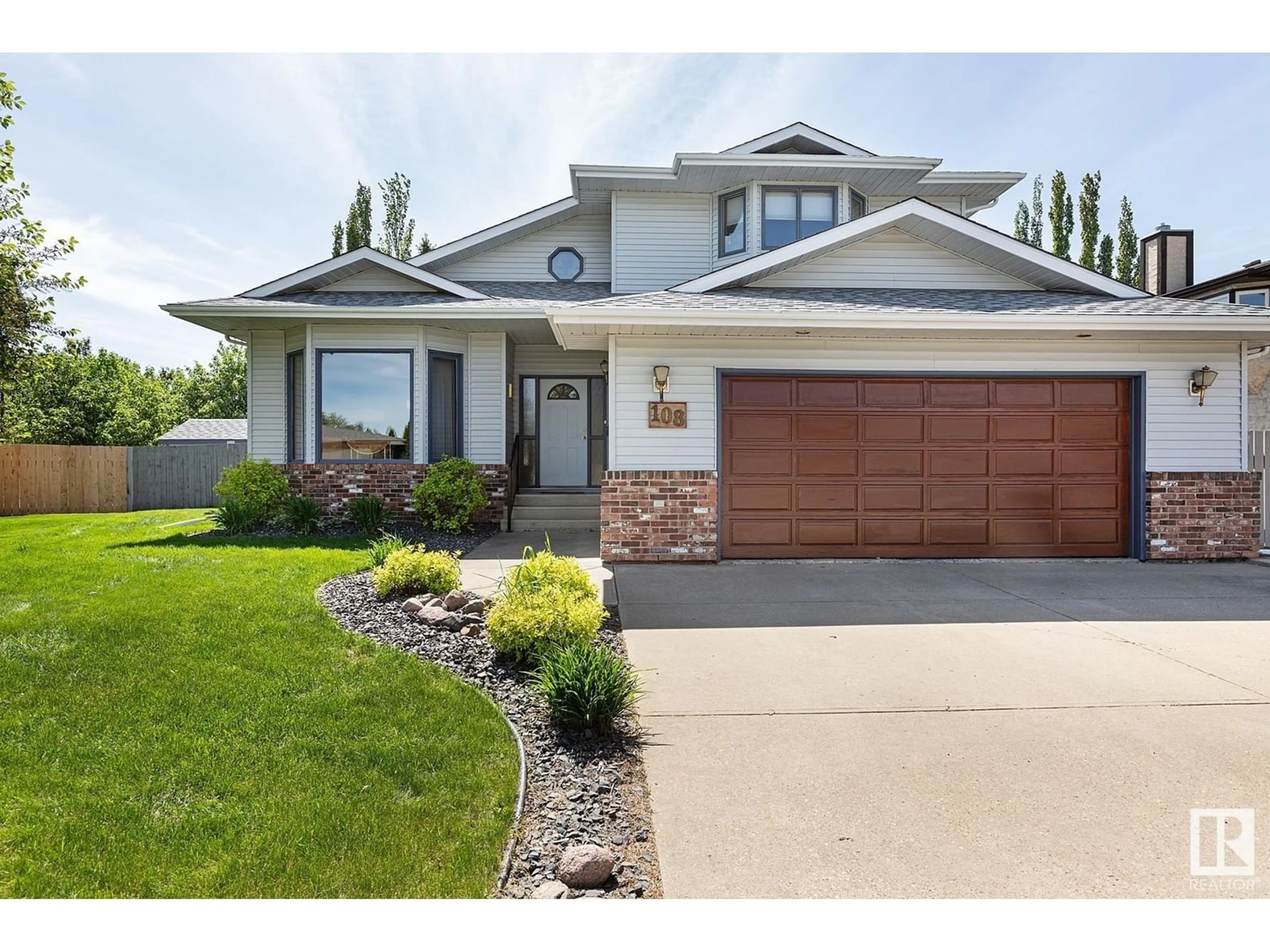 Home with vinyl exterior material, street for 108 CARMEL RD, Sherwood Park Alberta T8A5B5