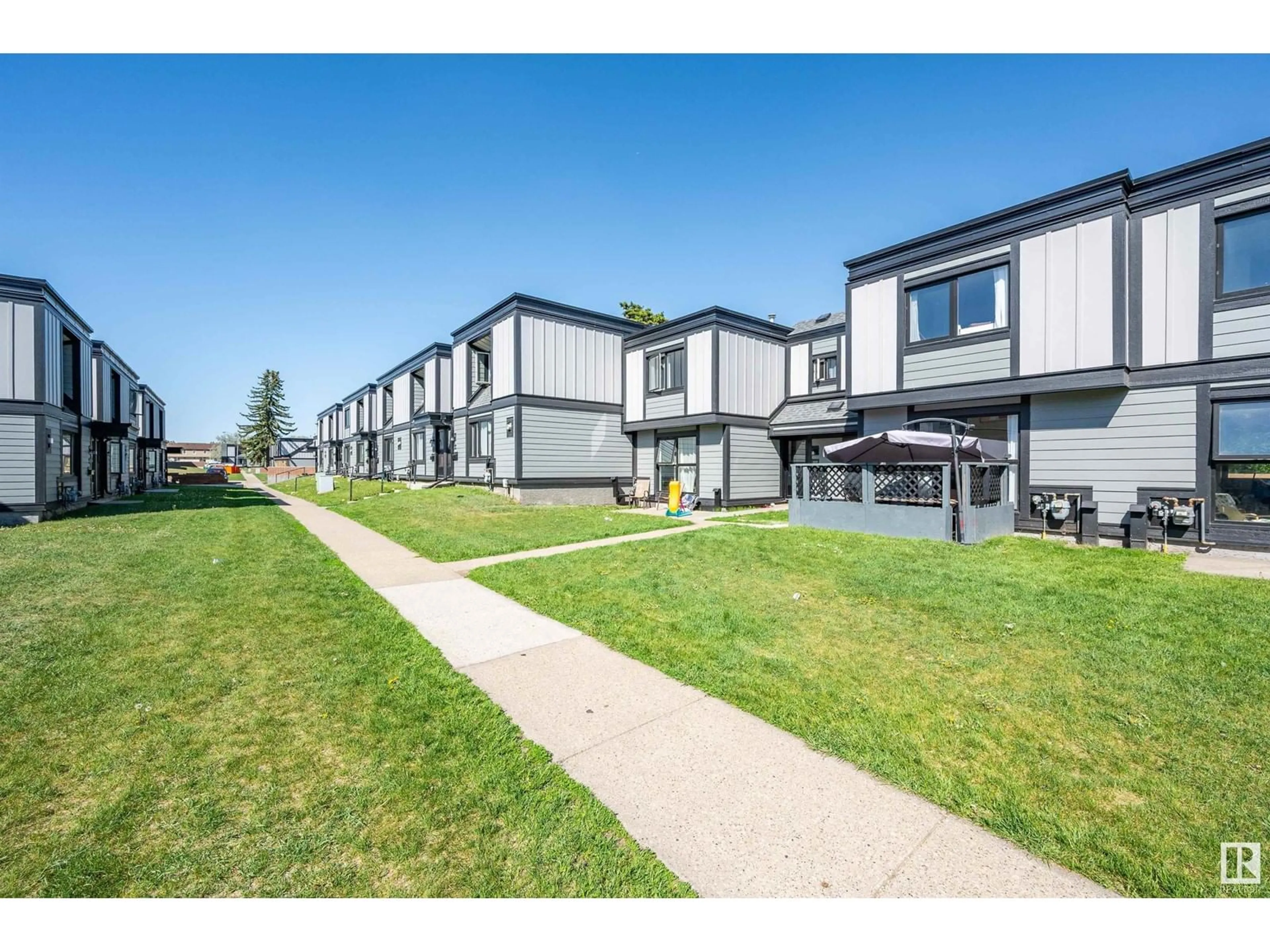 A pic from outside/outdoor area/front of a property/back of a property/a pic from drone, street for #152 - 3308 113 AV, Edmonton Alberta T5W5J8