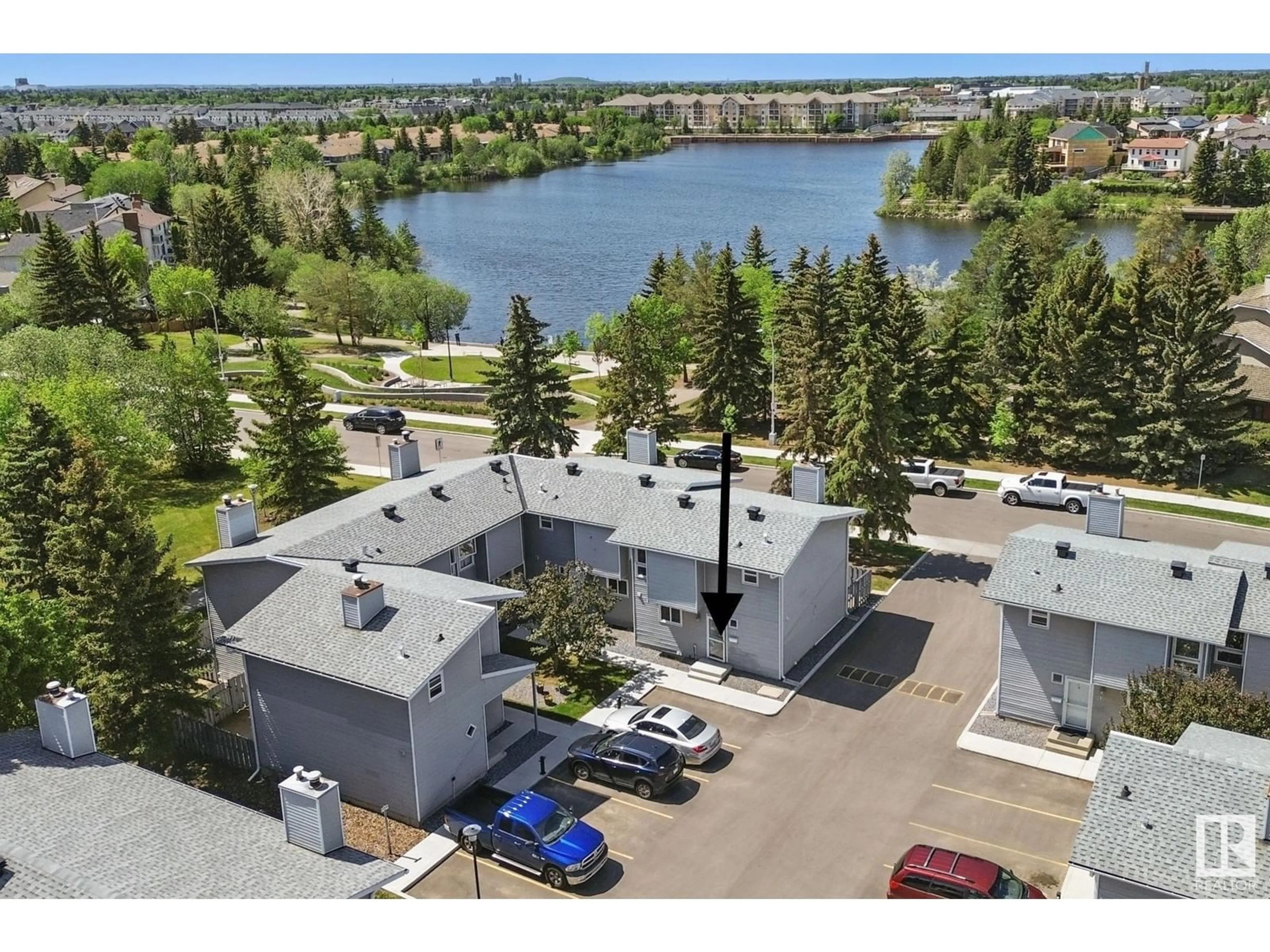 A pic from outside/outdoor area/front of a property/back of a property/a pic from drone, water/lake/river/ocean view for 15710 - 20 BEAUMARIS RD, Edmonton Alberta T5X5E2