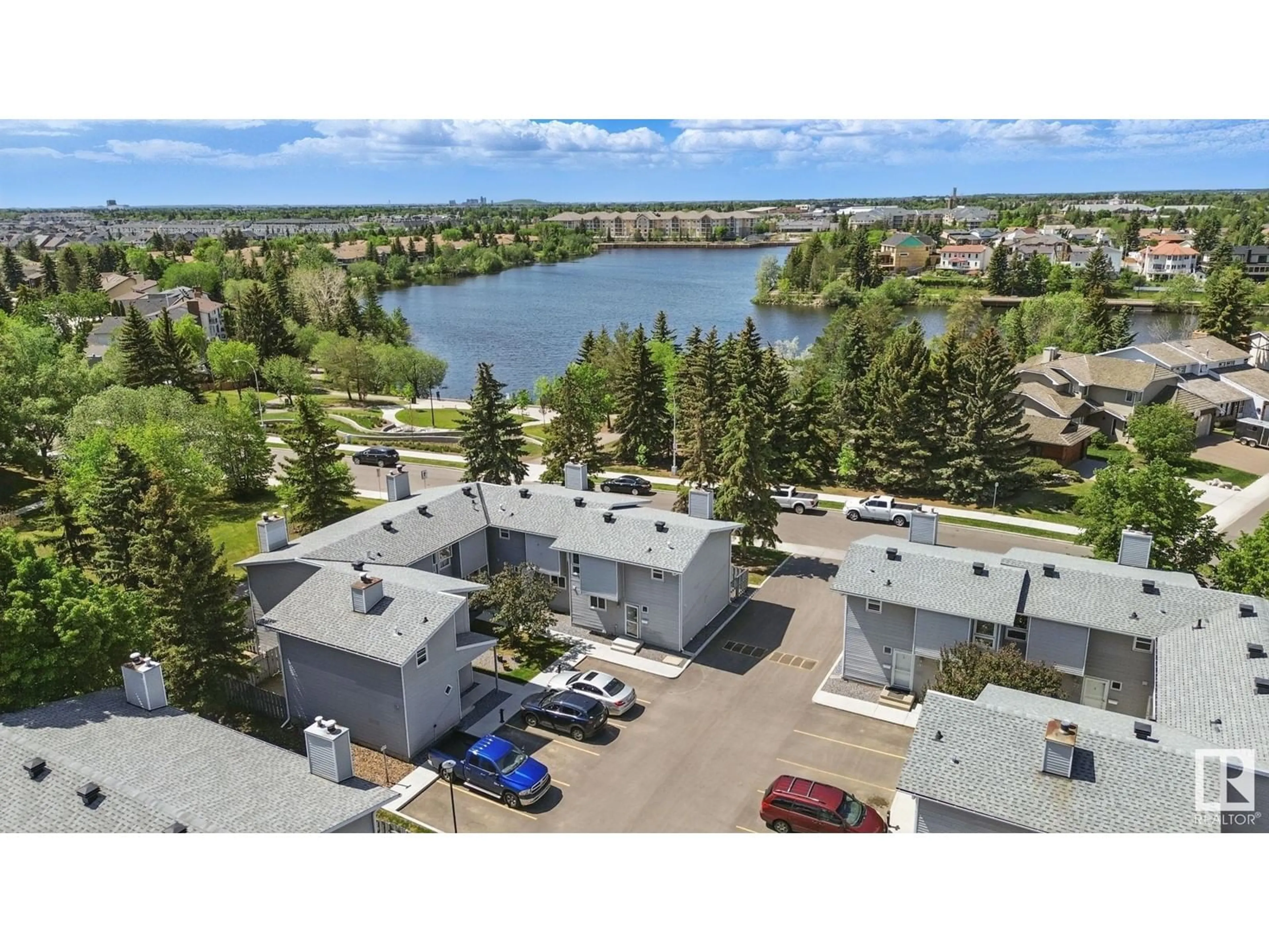 A pic from outside/outdoor area/front of a property/back of a property/a pic from drone, water/lake/river/ocean view for 15710 - 20 BEAUMARIS RD, Edmonton Alberta T5X5E2