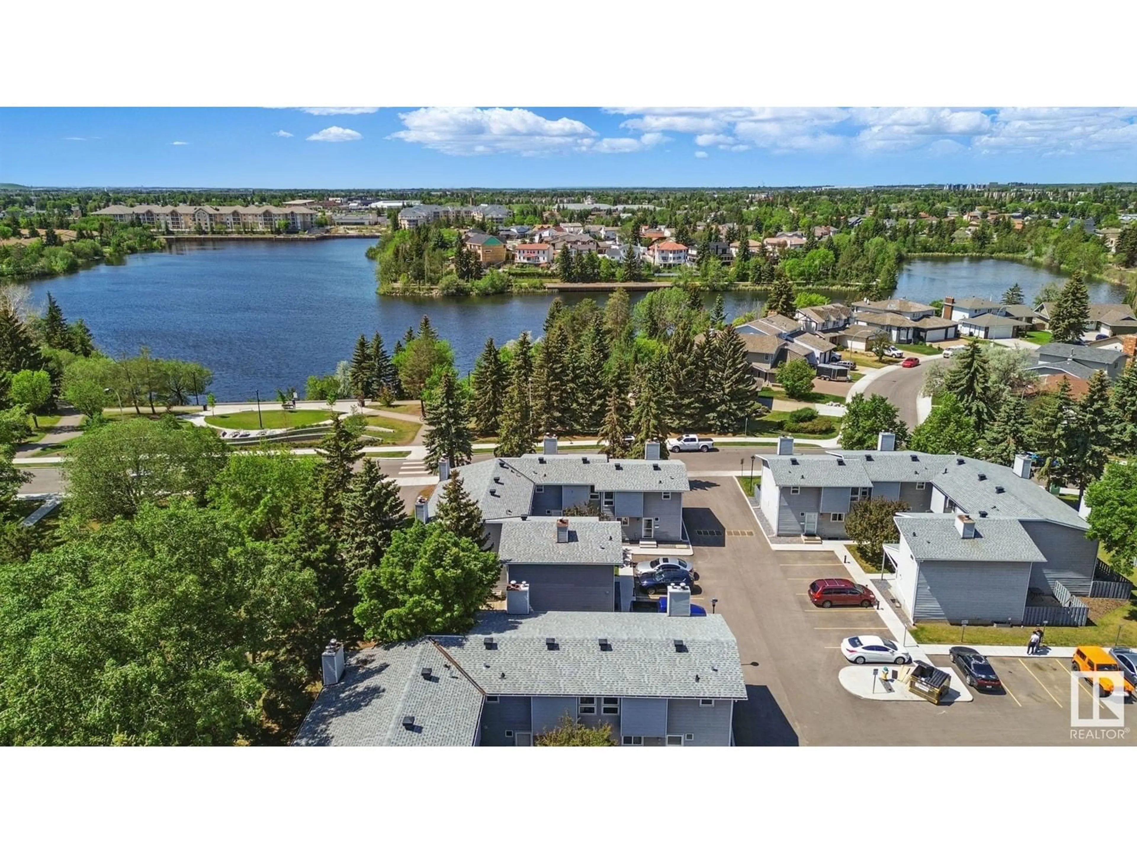 A pic from outside/outdoor area/front of a property/back of a property/a pic from drone, water/lake/river/ocean view for 15710 - 20 BEAUMARIS RD, Edmonton Alberta T5X5E2