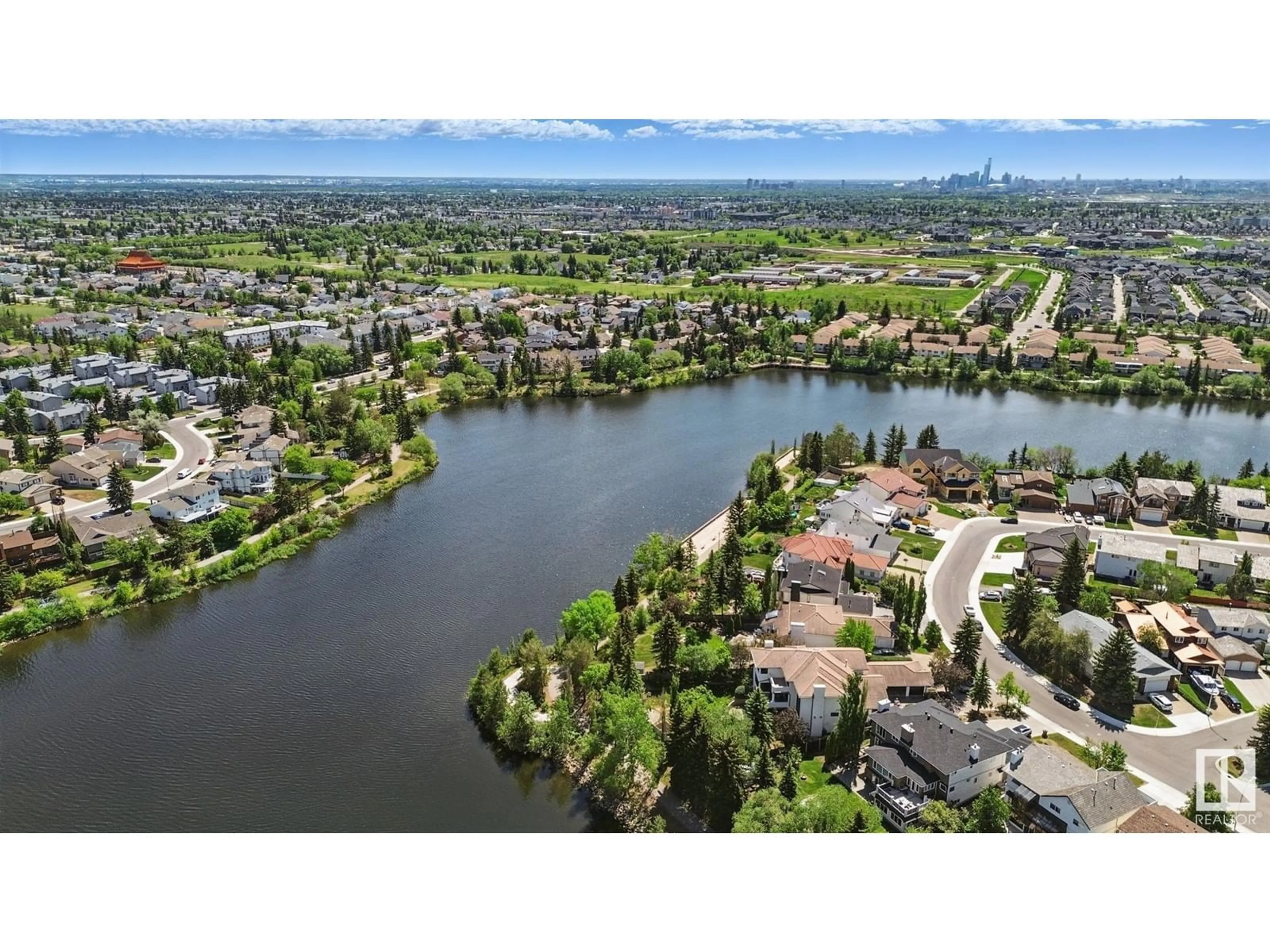 A pic from outside/outdoor area/front of a property/back of a property/a pic from drone, water/lake/river/ocean view for 15710 - 20 BEAUMARIS RD, Edmonton Alberta T5X5E2