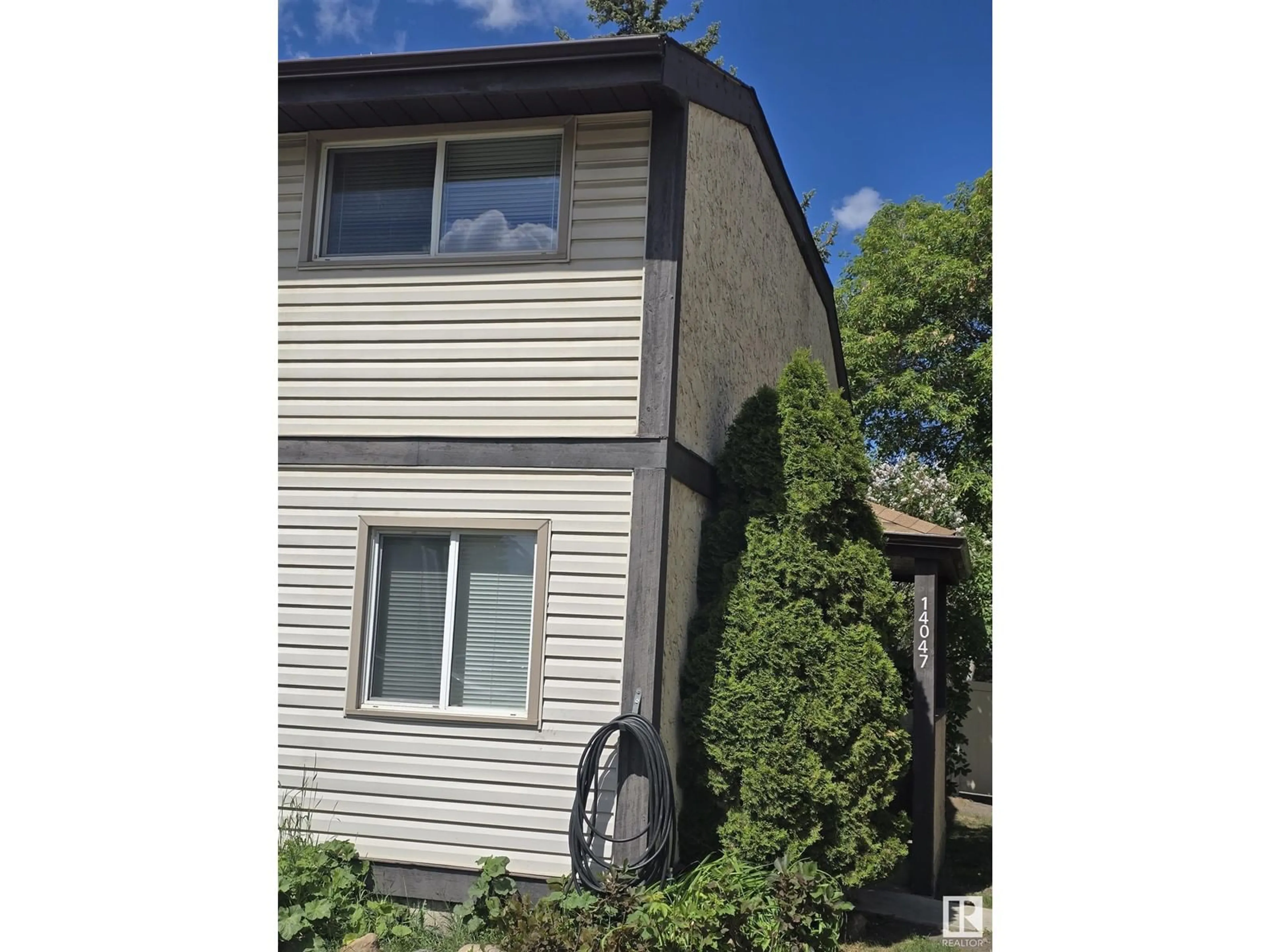 Home with vinyl exterior material, street for NW - 14047 30 ST, Edmonton Alberta T5Y1R5