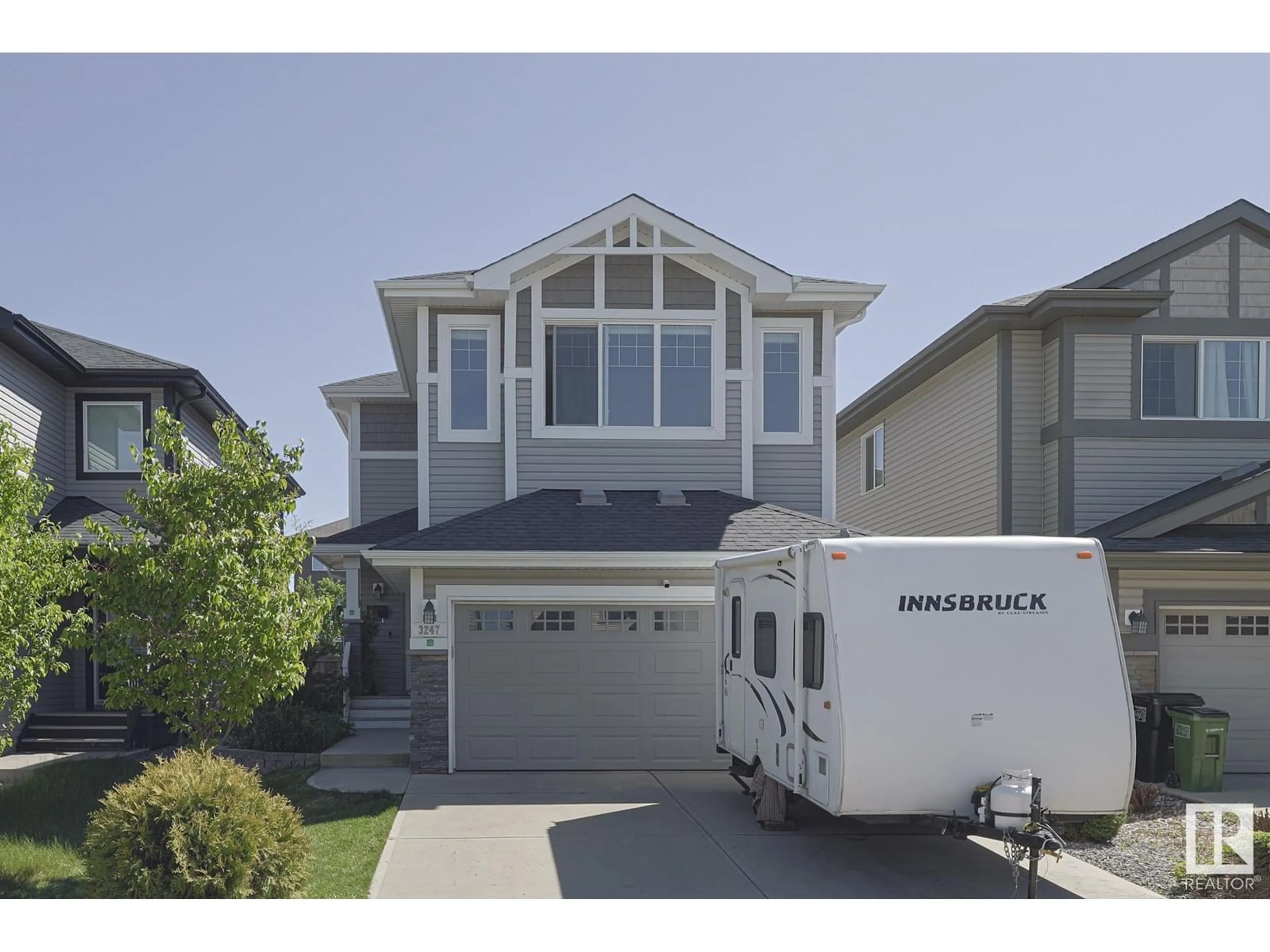 Home with vinyl exterior material, street for 3247 ABBOTT CR, Edmonton Alberta T6W2V3