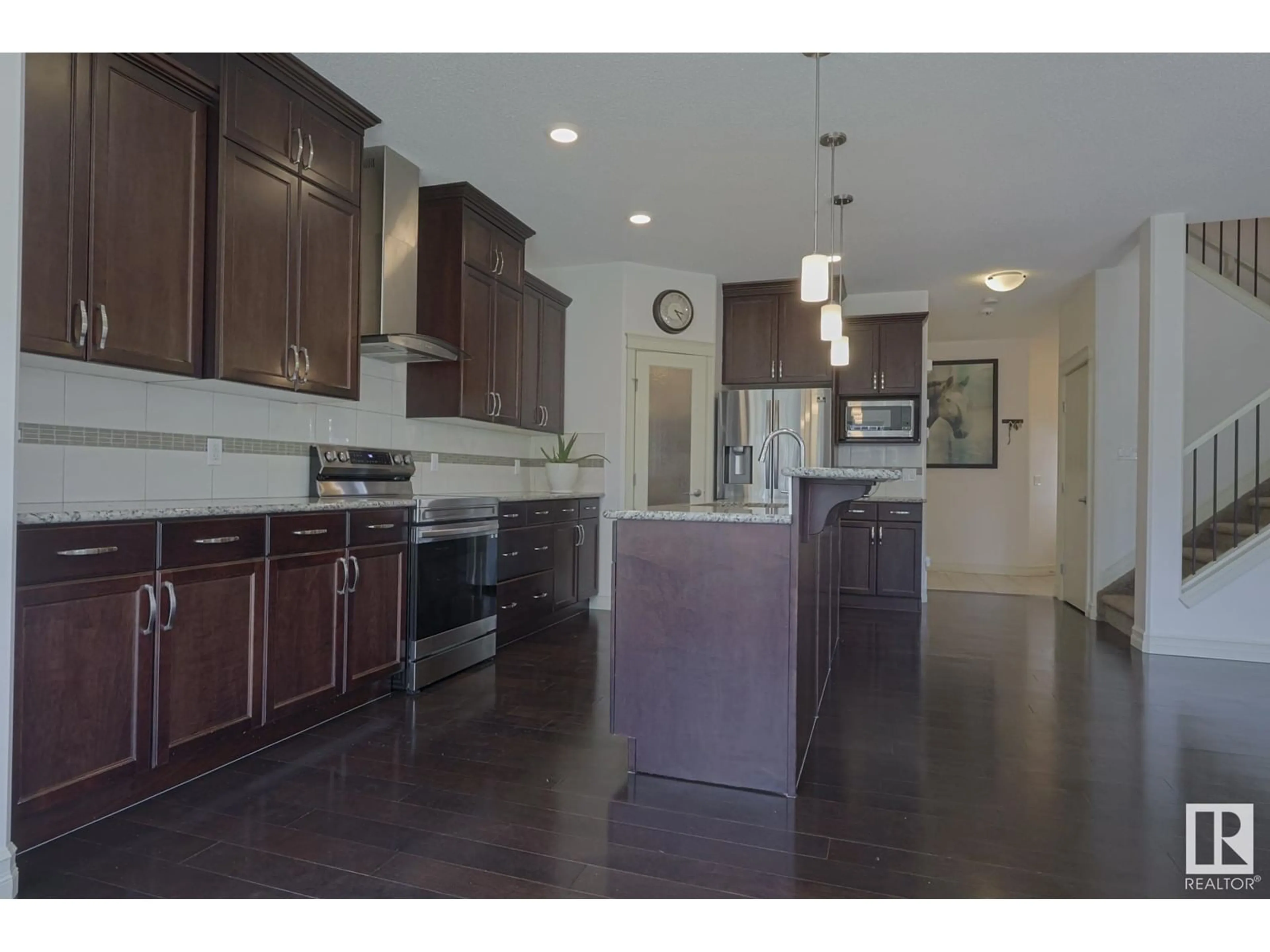 Open concept kitchen, ceramic/tile floor for 3247 ABBOTT CR, Edmonton Alberta T6W2V3