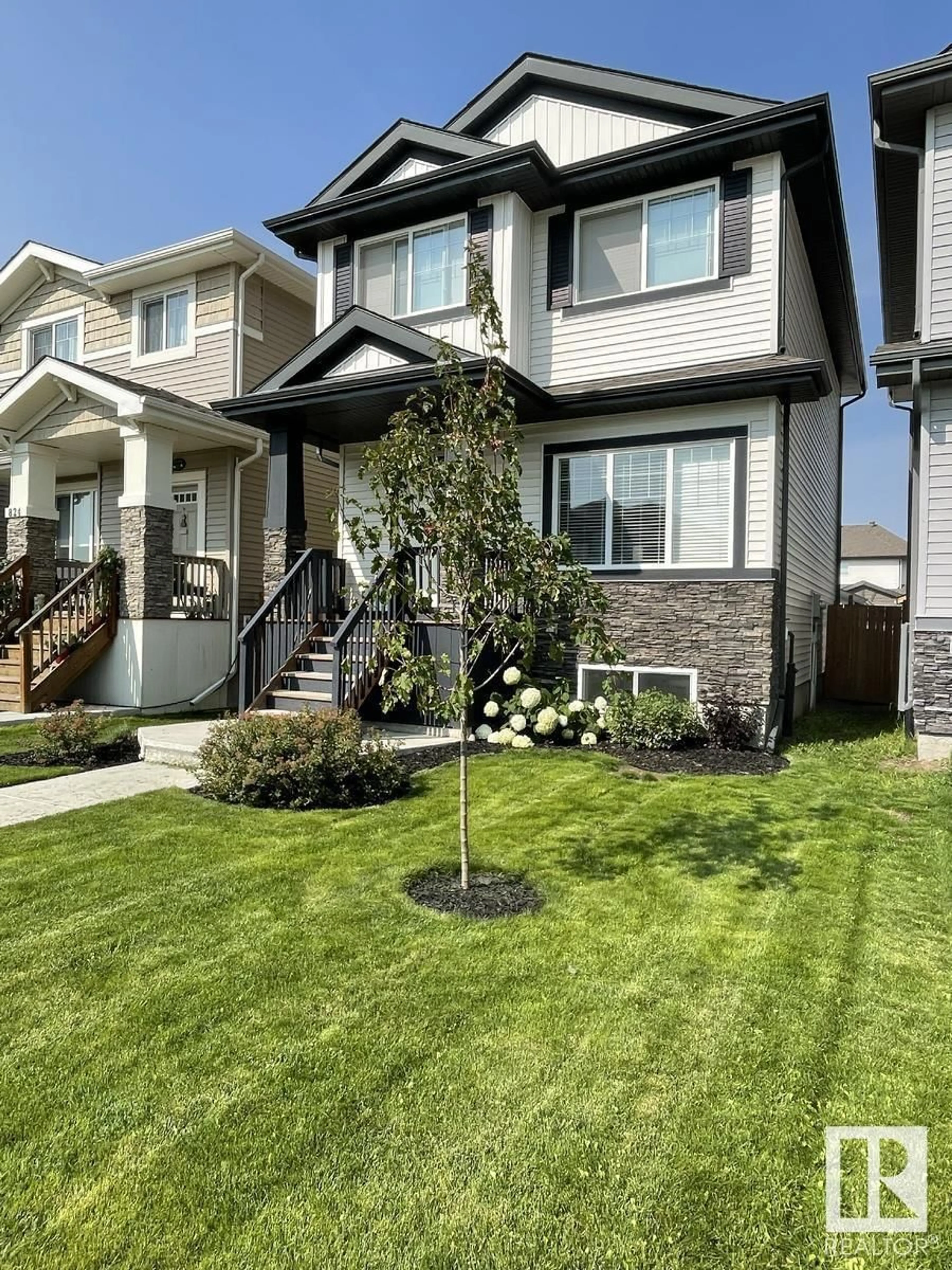 Home with vinyl exterior material, street for 822 MORRIS AV, Leduc Alberta T9E1E9