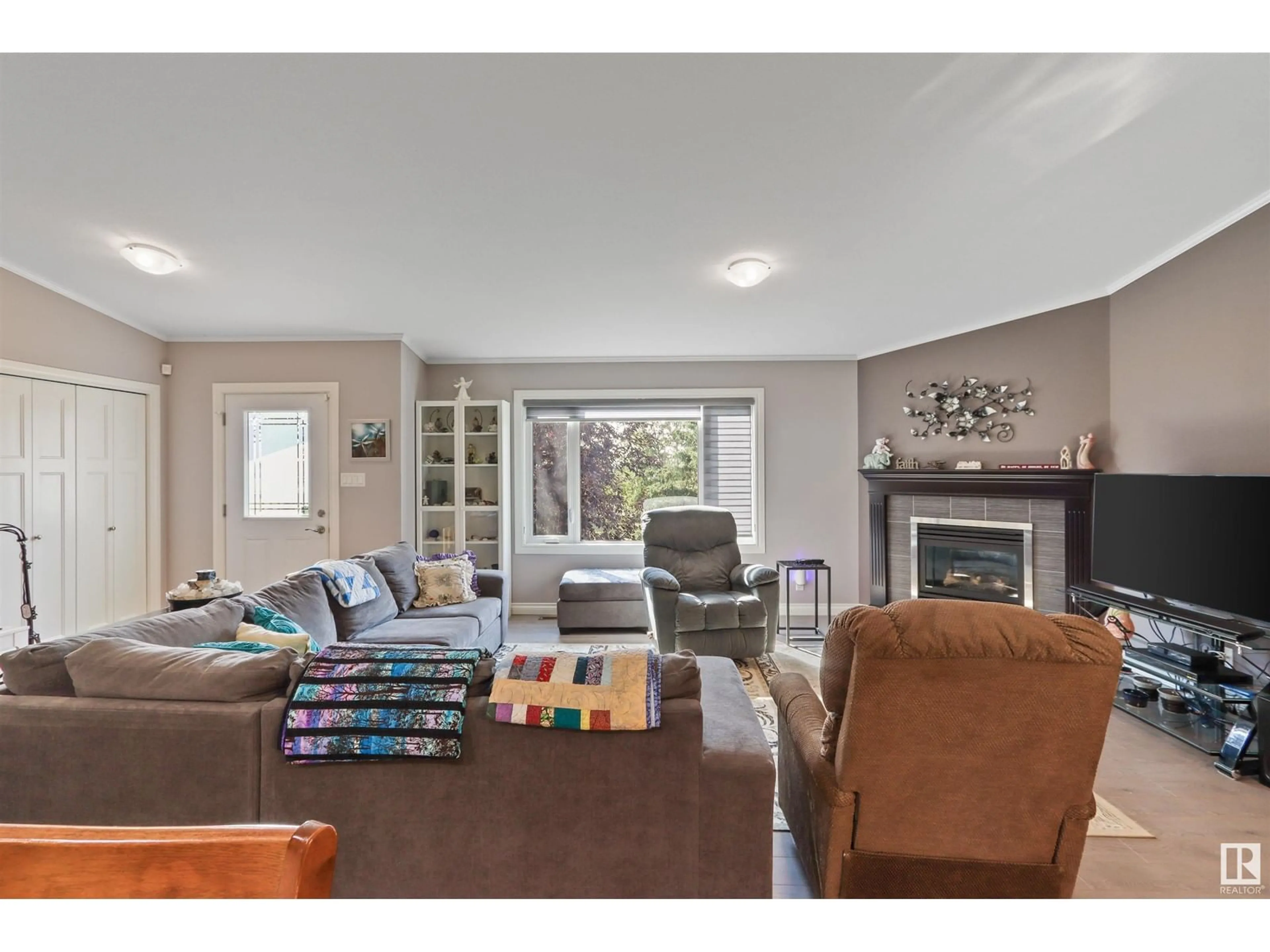 Living room with furniture, wood/laminate floor for 49525 RGE ROAD 85, Rural Brazeau County Alberta T0E1Z0