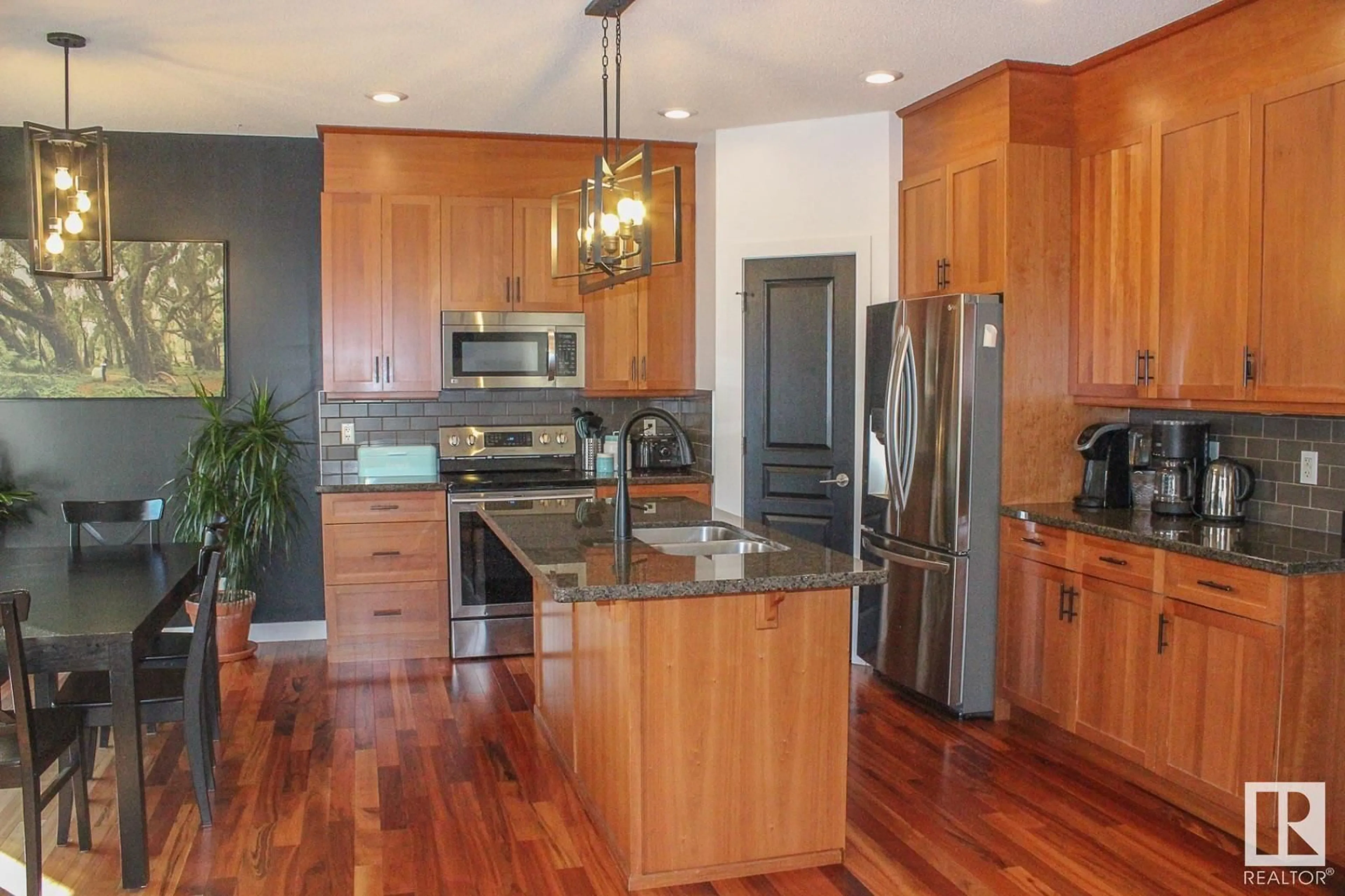 Contemporary kitchen, wood/laminate floor for 8827 180 AV, Edmonton Alberta T5Z0C4