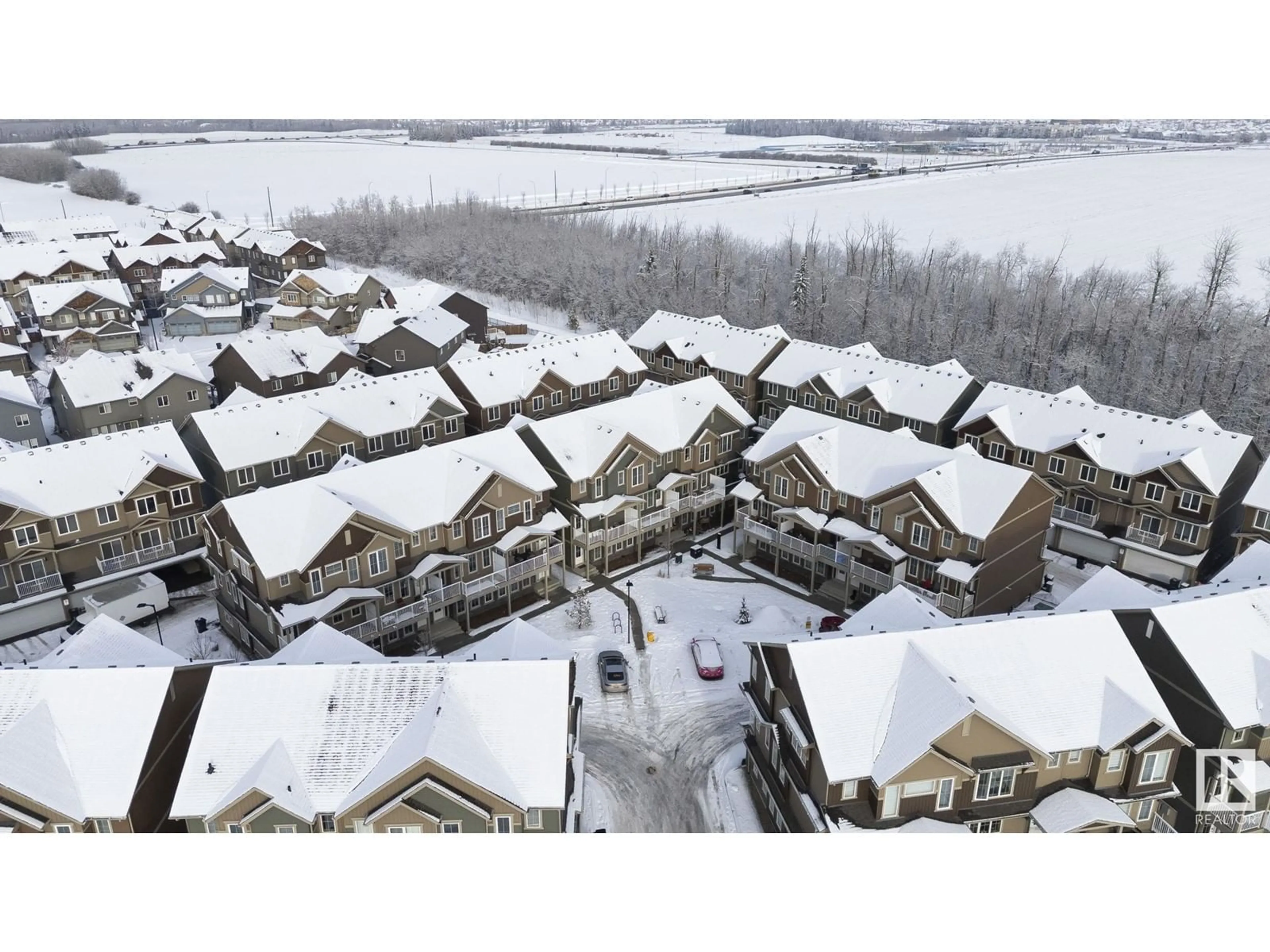 A pic from outside/outdoor area/front of a property/back of a property/a pic from drone, mountain view for #45 - 1051 GRAYDON HILL BLVD, Edmonton Alberta T6W3C8