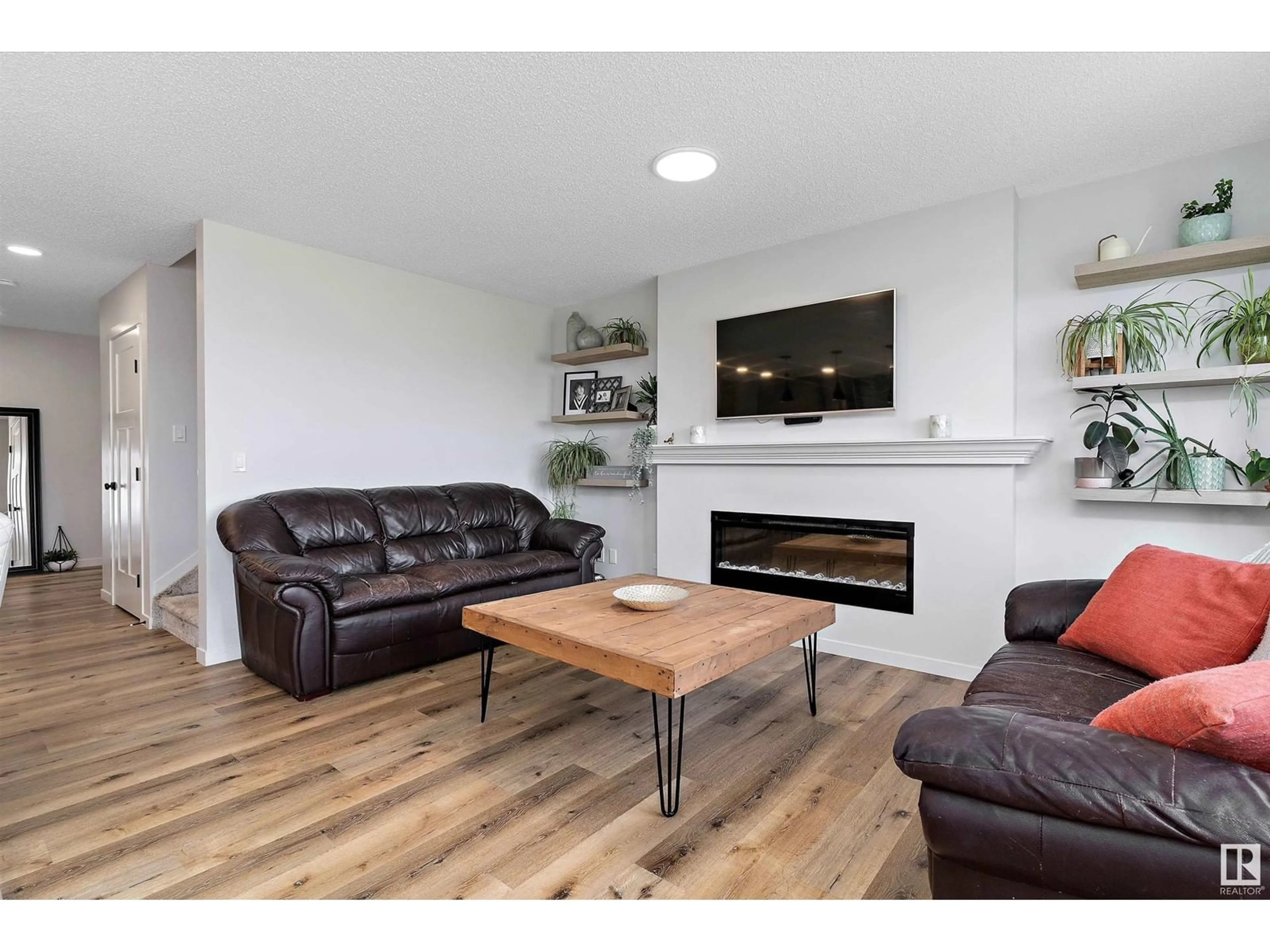 Living room with furniture, wood/laminate floor for 6 CALEDON CR, Spruce Grove Alberta T7X0Y8
