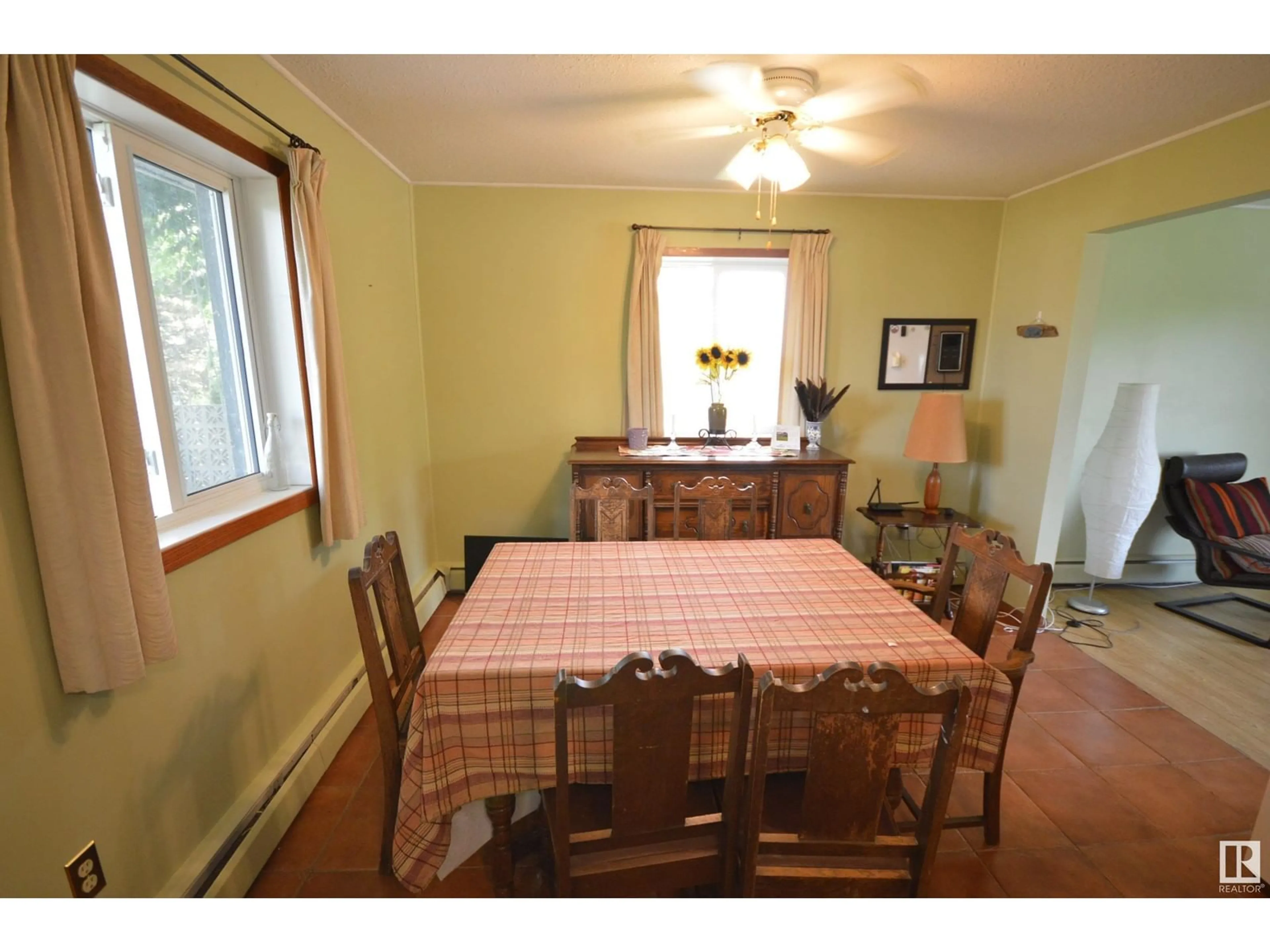 Dining room, wood/laminate floor for 5003 LAKESHORE DR, Bonnyville Town Alberta T9N2J6