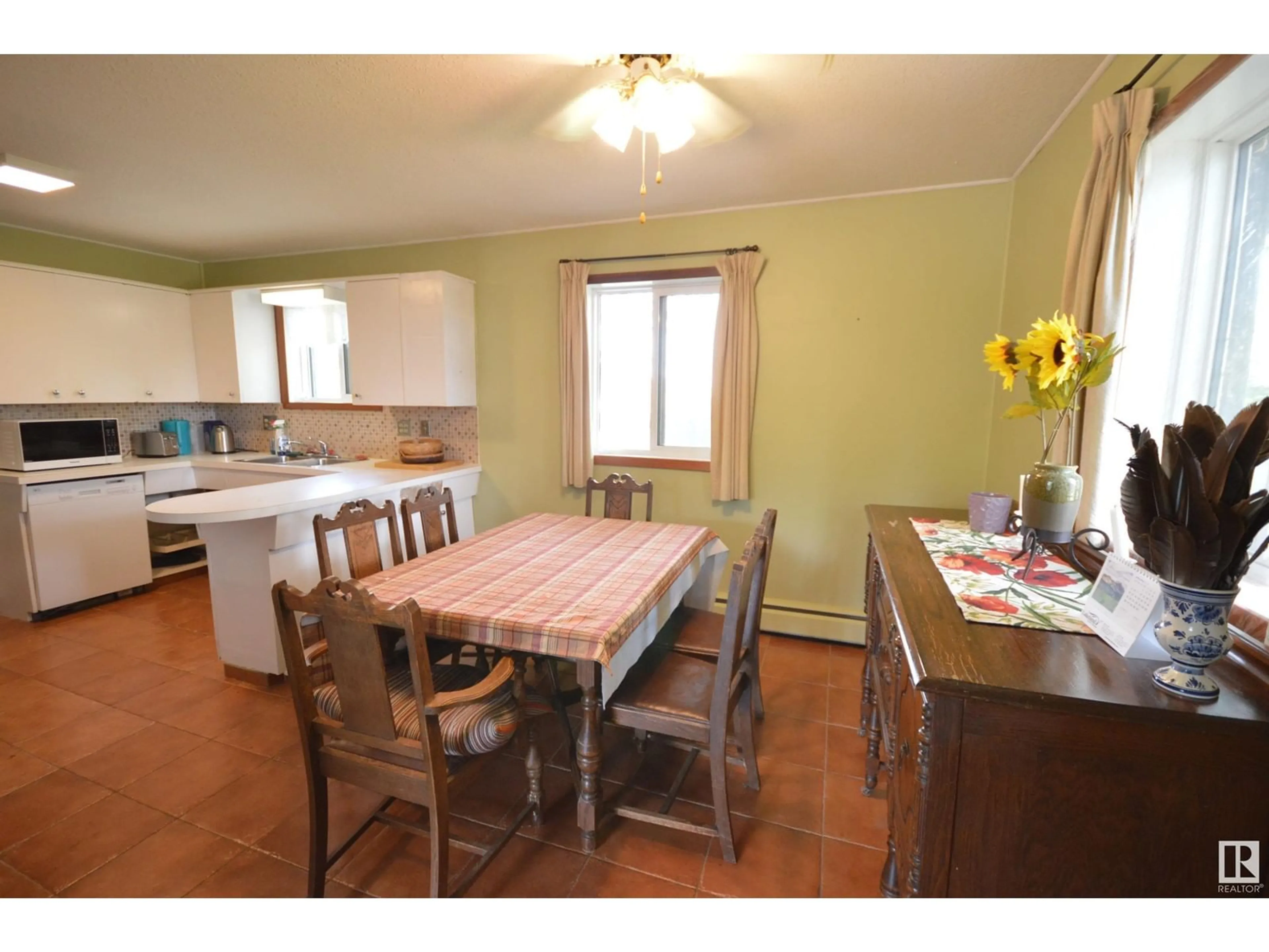 Dining room, wood/laminate floor for 5003 LAKESHORE DR, Bonnyville Town Alberta T9N2J6