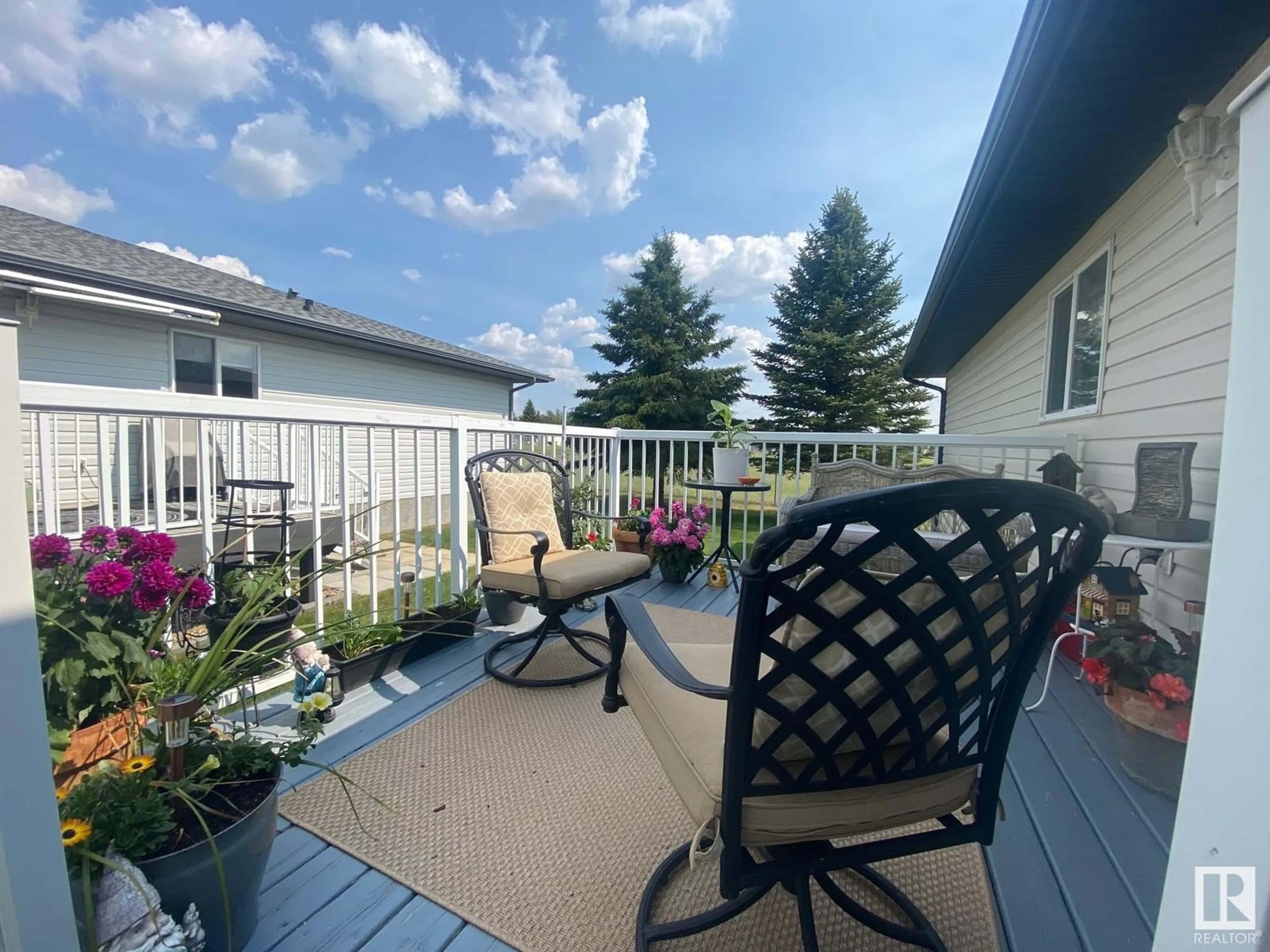 Patio, water/lake/river/ocean view for 102 - 7000 DR, Wetaskiwin Alberta T9A3R9