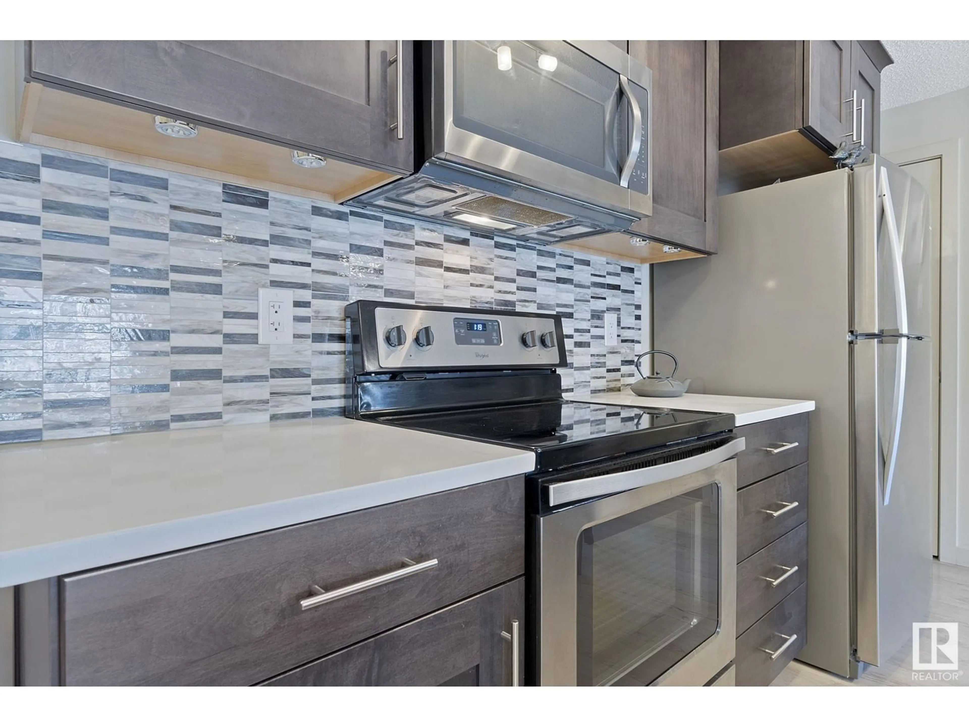 Standard kitchen, ceramic/tile floor for #305 - 4008 SAVARYN DR, Edmonton Alberta T6X2E5