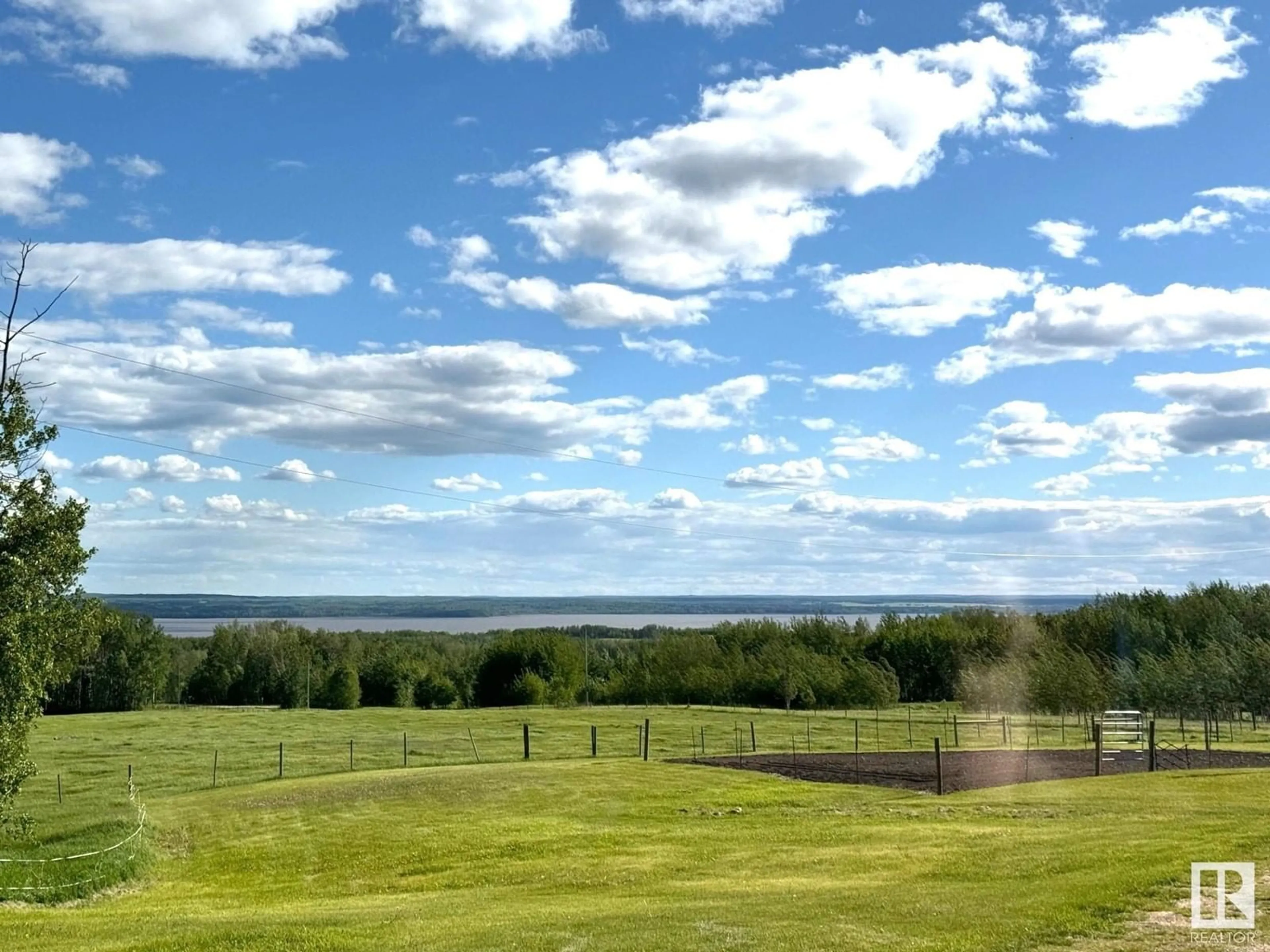 A pic from outside/outdoor area/front of a property/back of a property/a pic from drone, water/lake/river/ocean view for 54509 RRD 101, Rural Yellowhead Alberta T0E2M0