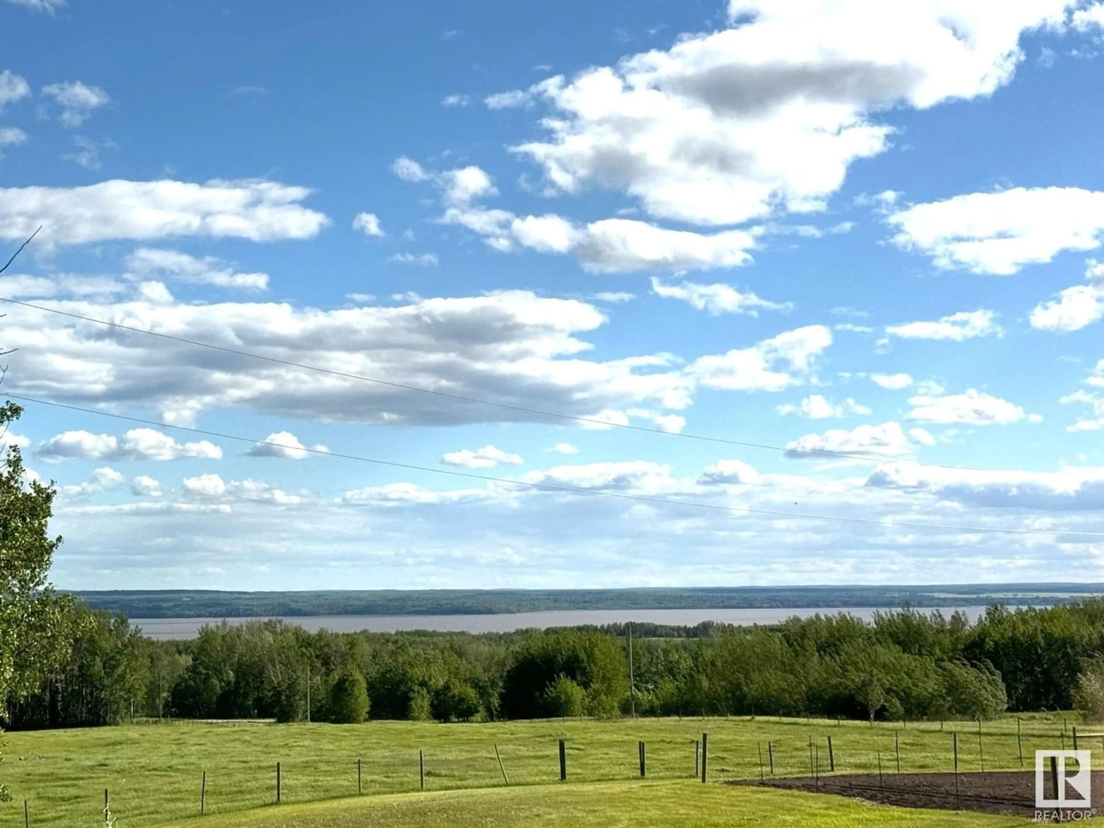 A pic from outside/outdoor area/front of a property/back of a property/a pic from drone, water/lake/river/ocean view for 54509 RRD 101, Rural Yellowhead Alberta T0E2M0
