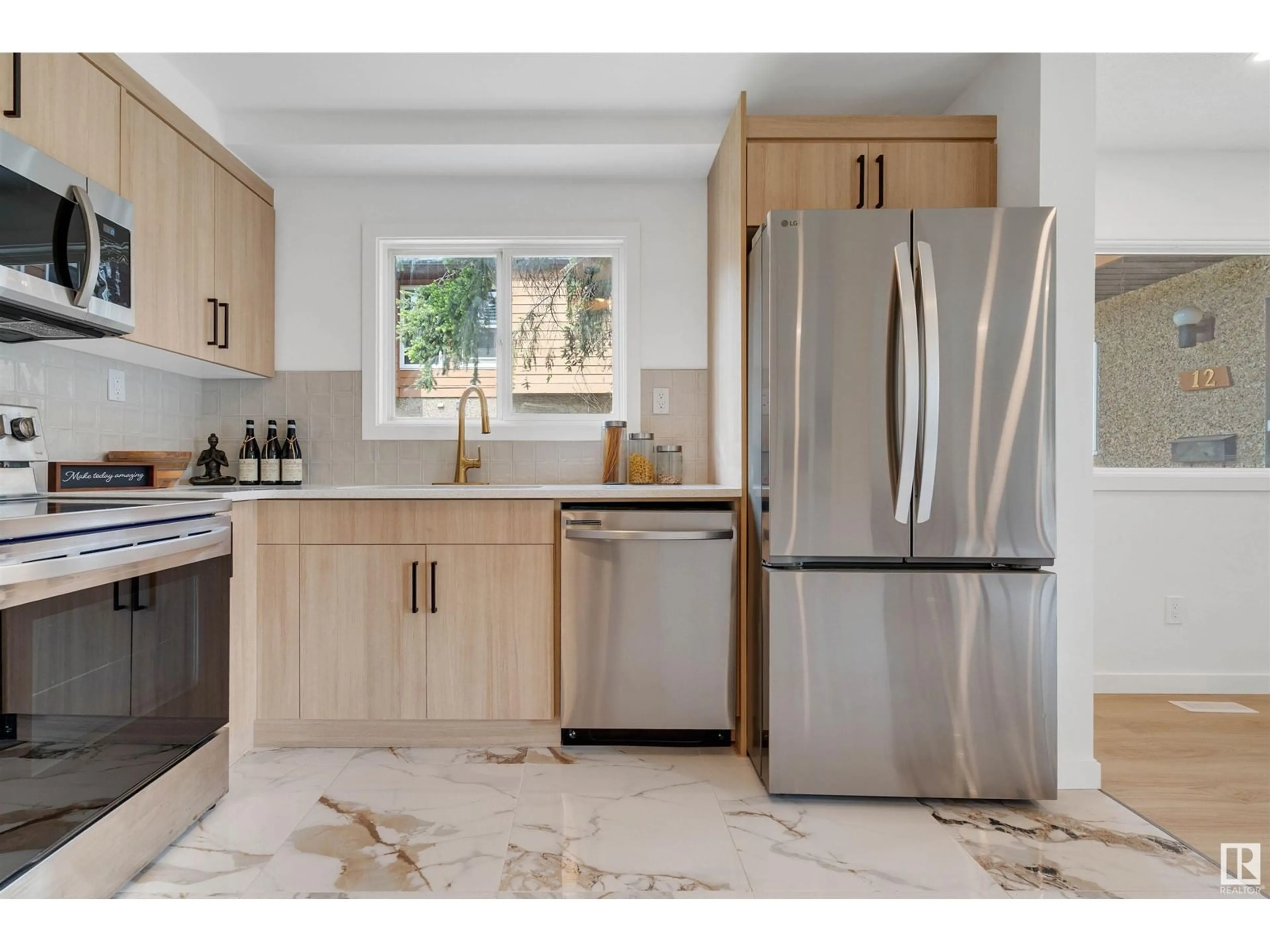 Open concept kitchen, ceramic/tile floor for 11 - 3812 20 AV, Edmonton Alberta T6L4B2