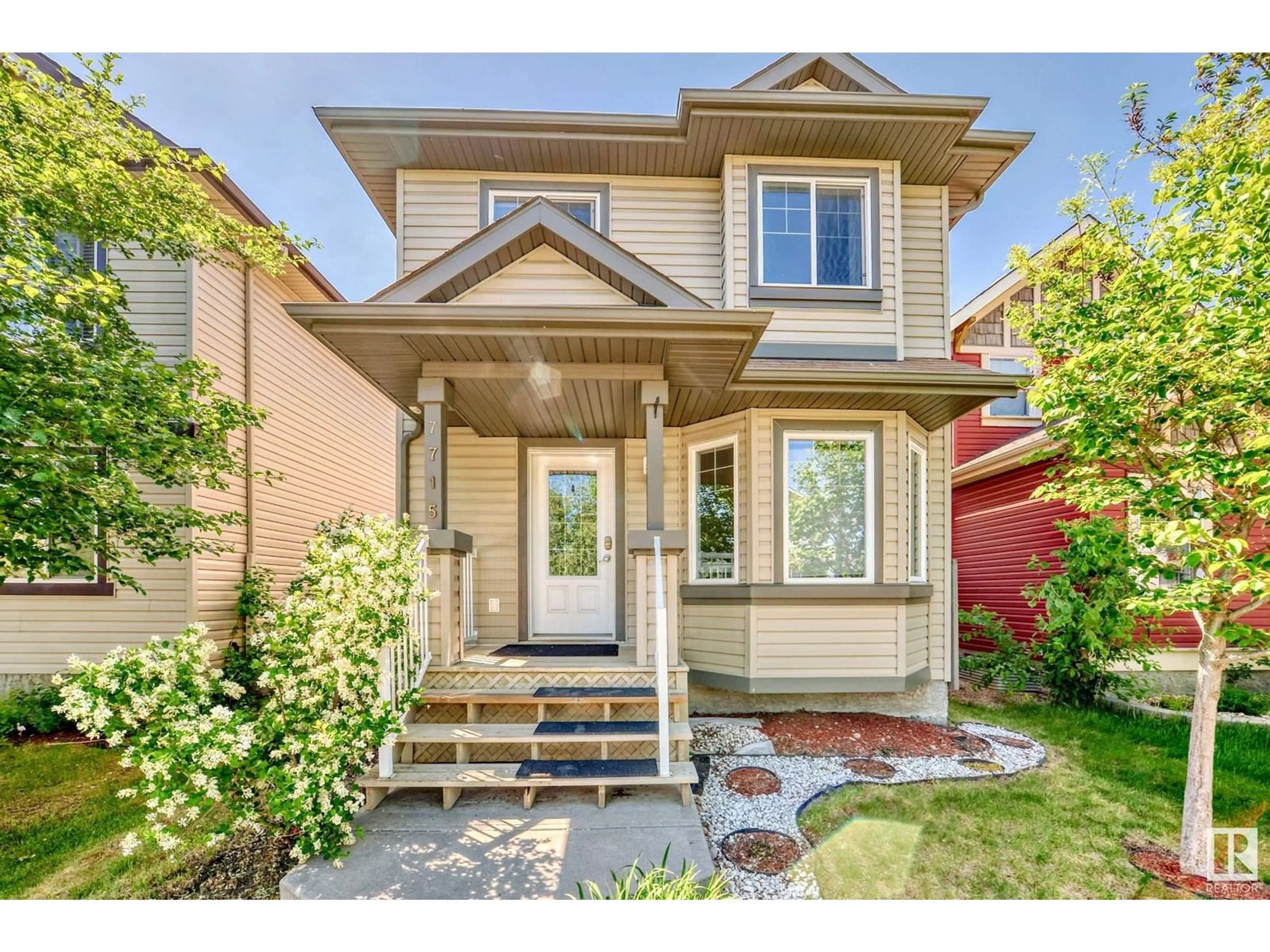 Home with vinyl exterior material, street for 7715 SCHMID CR, Edmonton Alberta T6R0K6