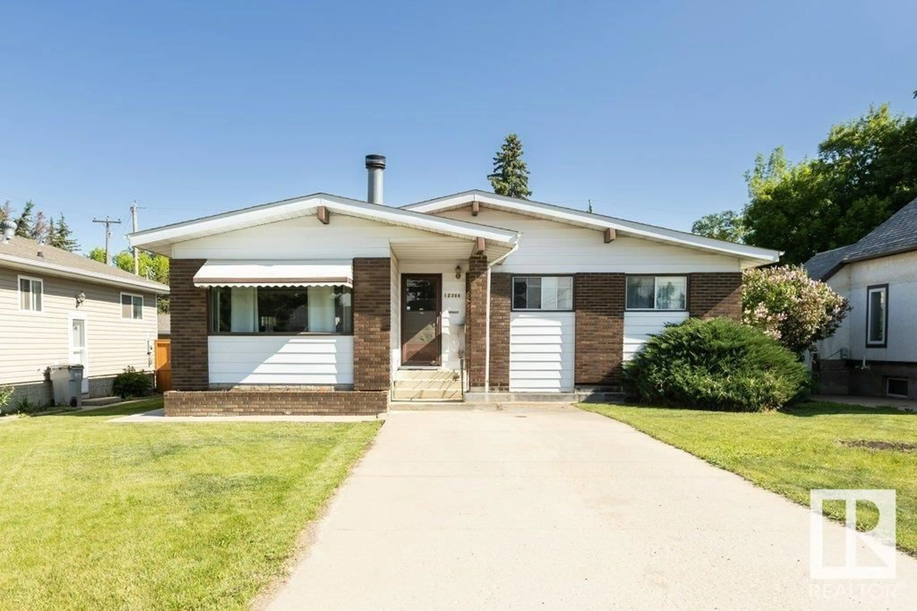 Home with brick exterior material, street for 10208 101 ST, Westlock Alberta T7P1X9