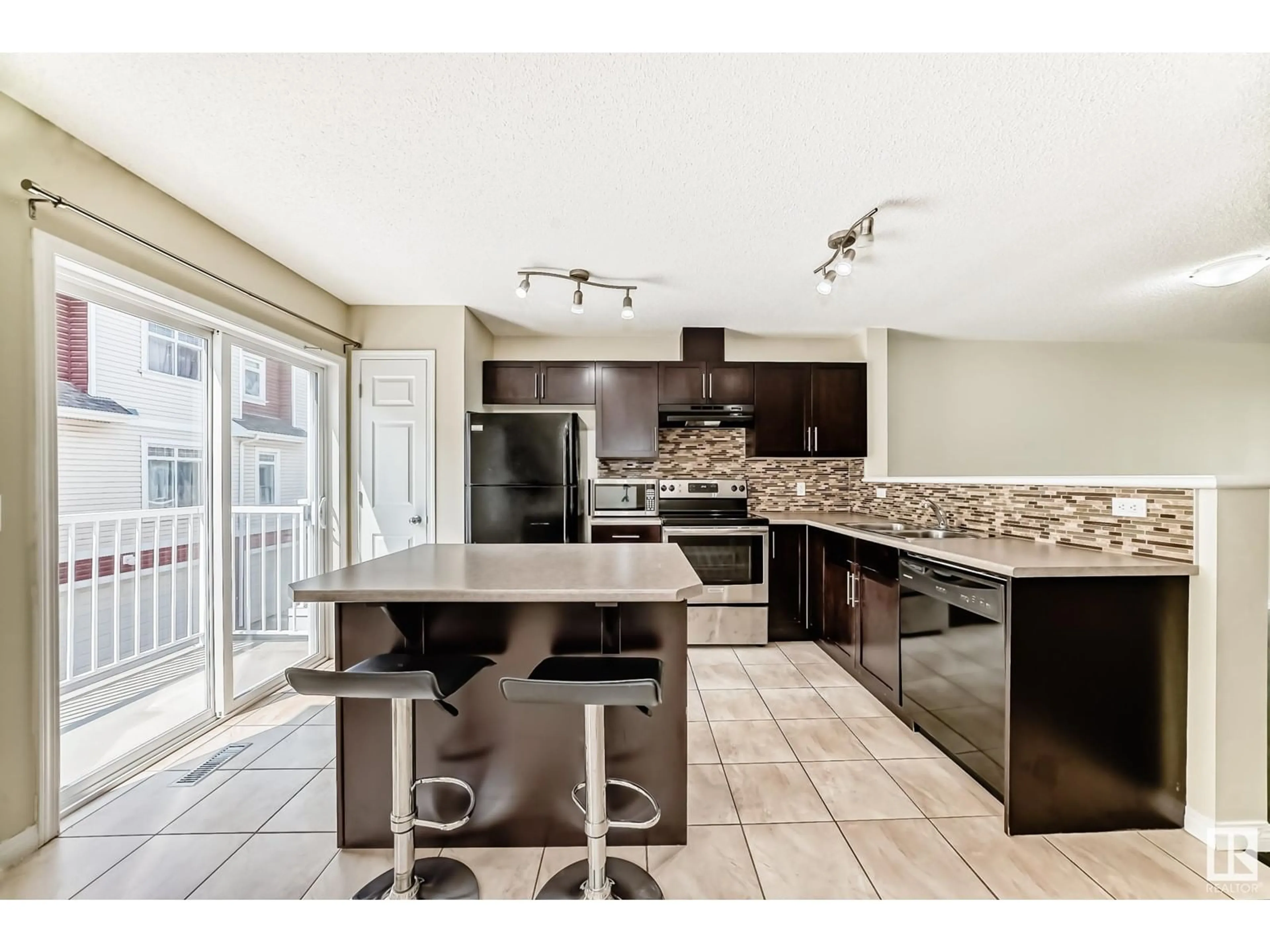 Open concept kitchen, ceramic/tile floor for SW - 149 1804 70 ST, Edmonton Alberta T6X0H4