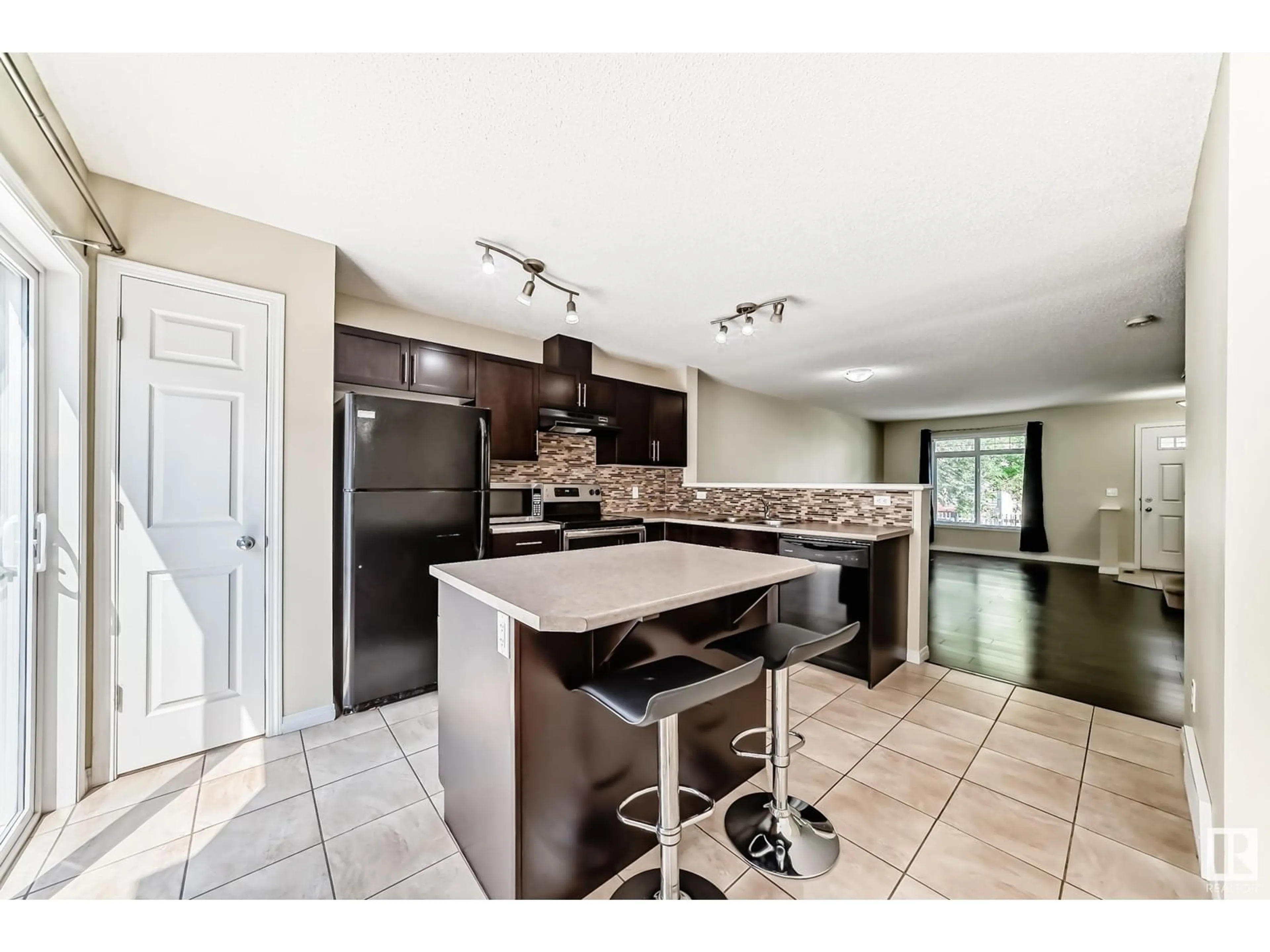 Open concept kitchen, ceramic/tile floor for SW - 149 1804 70 ST, Edmonton Alberta T6X0H4