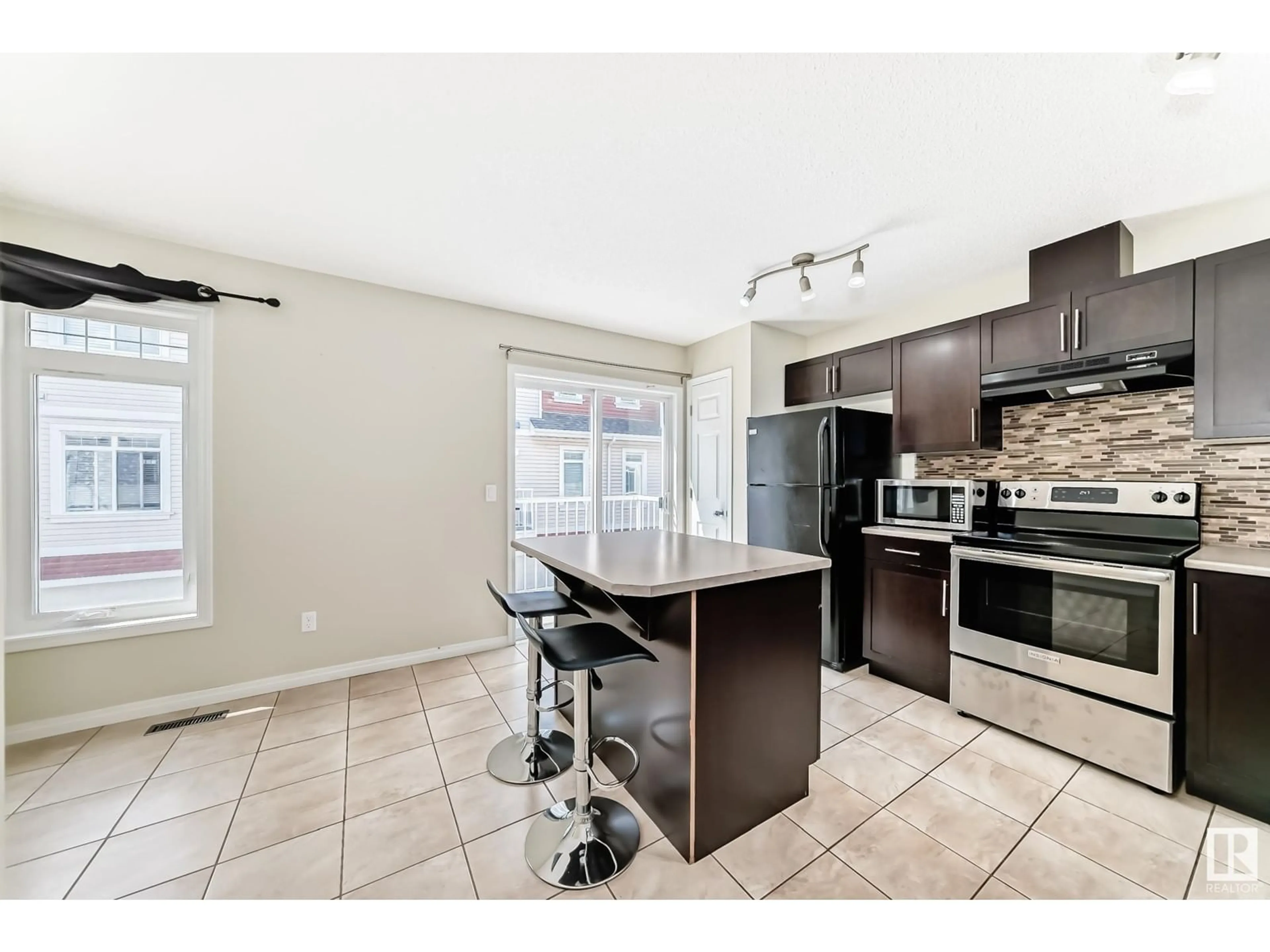 Open concept kitchen, unknown for SW - 149 1804 70 ST, Edmonton Alberta T6X0H4