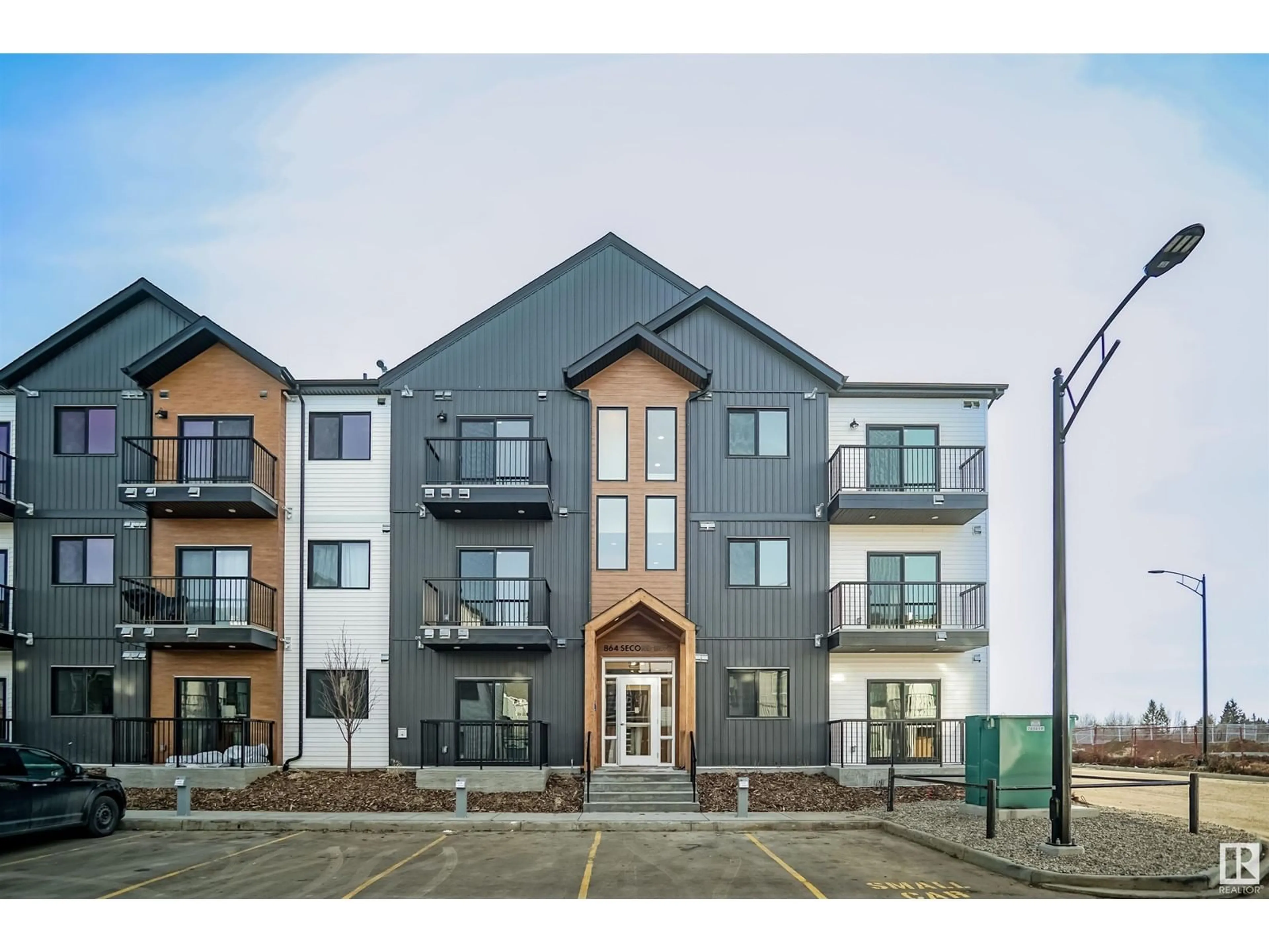 A pic from outside/outdoor area/front of a property/back of a property/a pic from drone, building for #104 - 9211 228 ST, Edmonton Alberta T5T7R9
