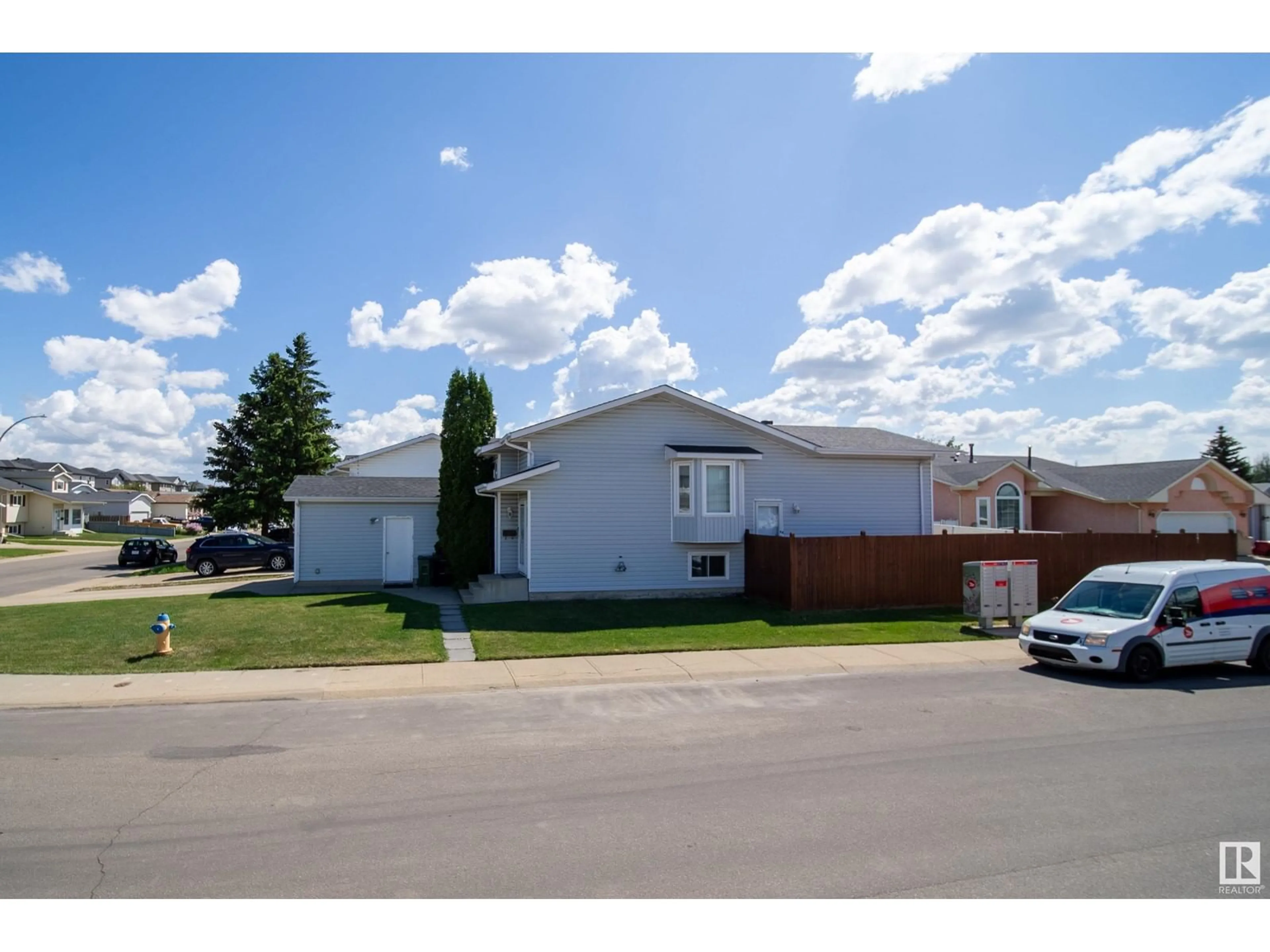 Home with vinyl exterior material, street for 9347 180A AV, Edmonton Alberta T5Z2J4