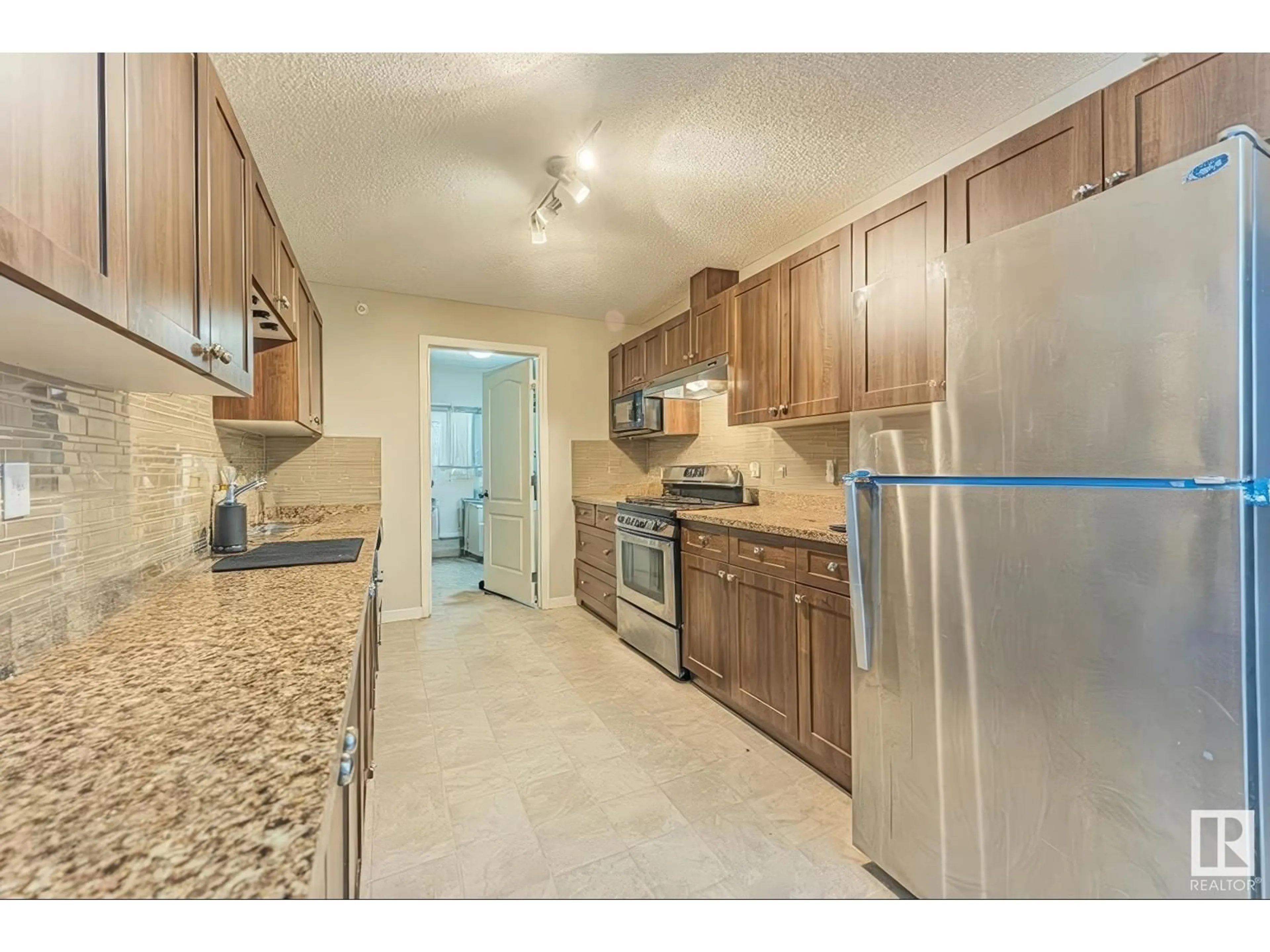 Standard kitchen, ceramic/tile floor for #449 - 1520 HAMMOND GATE, Edmonton Alberta T6M0J4