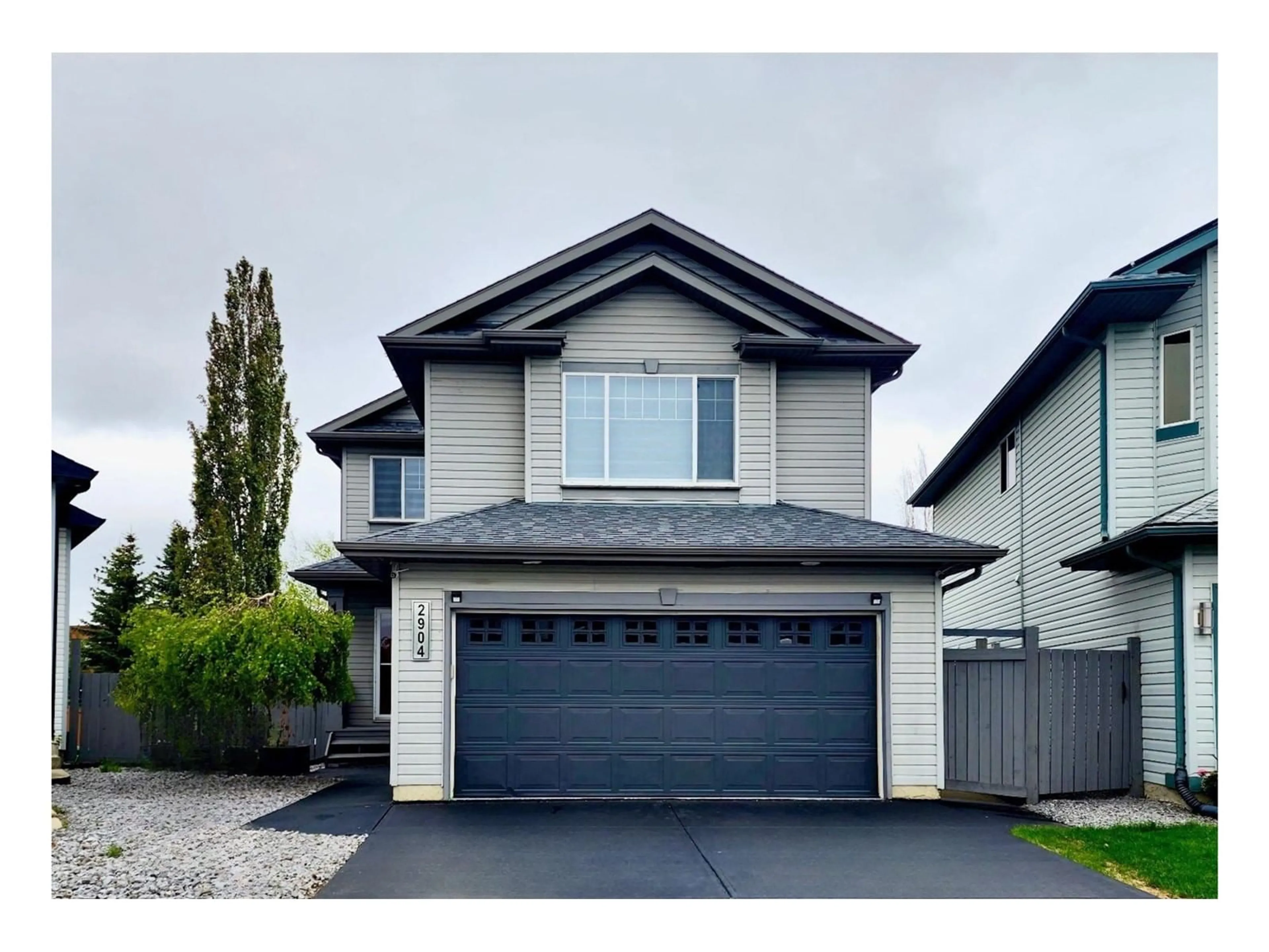 Home with vinyl exterior material, street for NW - 2904 33A ST, Edmonton Alberta T6T1V5