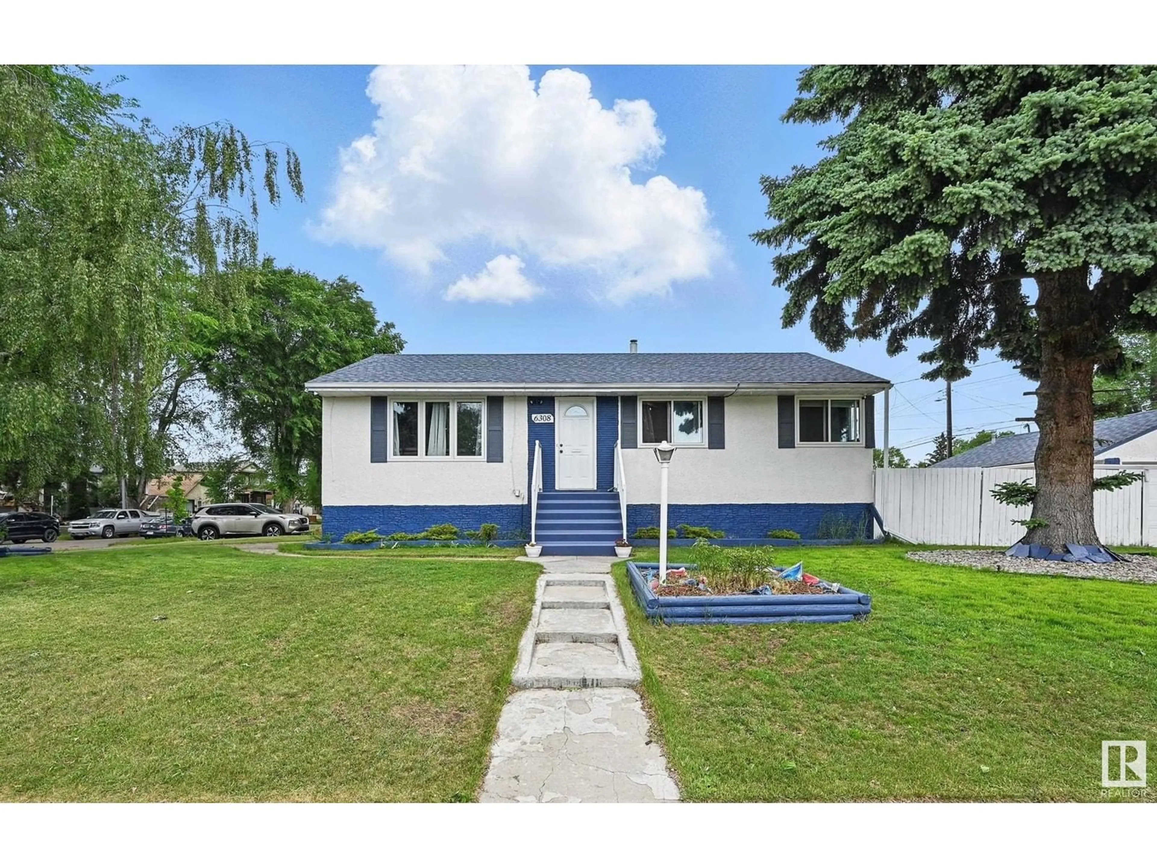 Home with vinyl exterior material, street for NW - 6308 130 AV, Edmonton Alberta T5A0G7