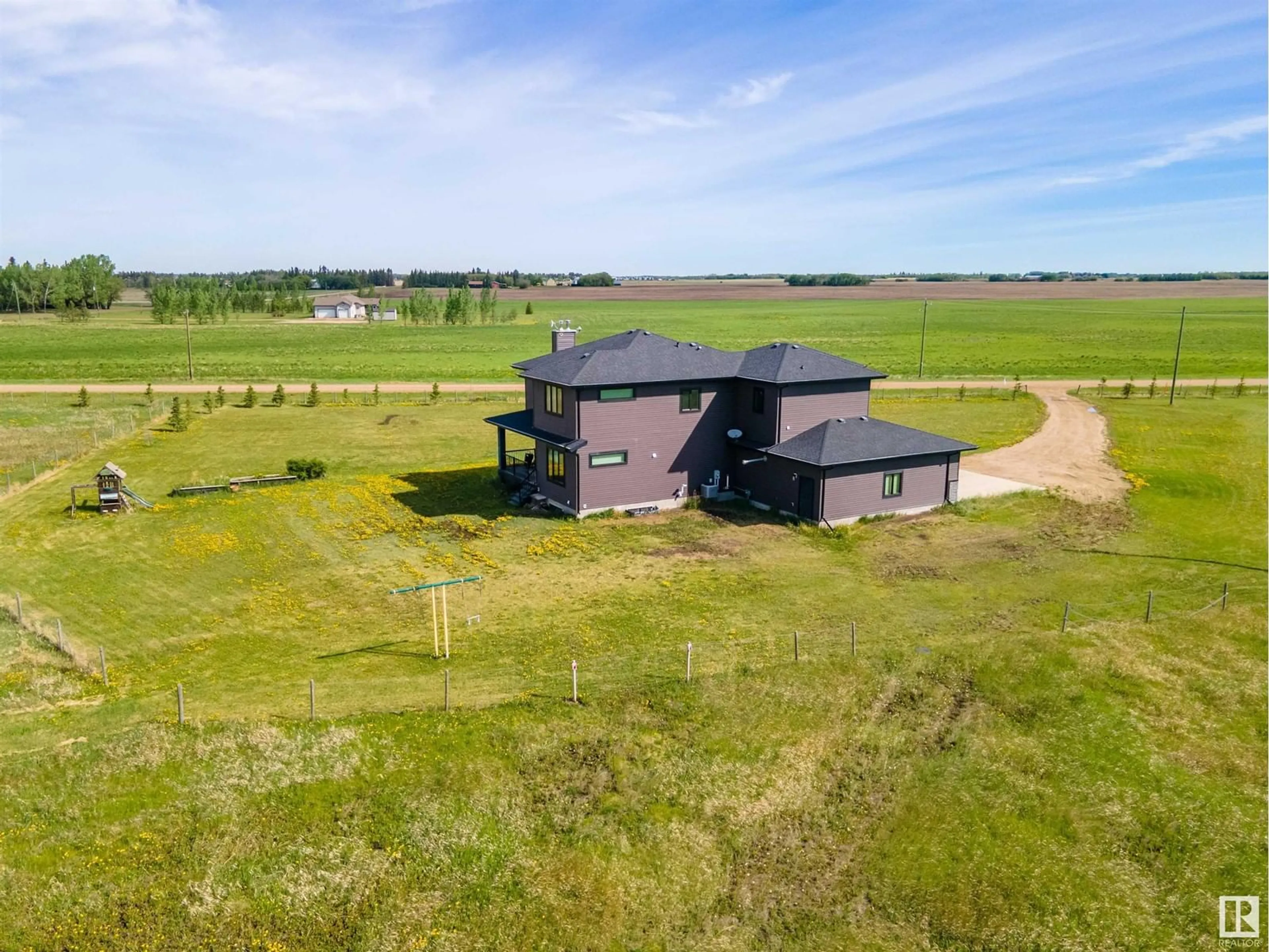 A pic from outside/outdoor area/front of a property/back of a property/a pic from drone, building for 26231 TWP RD 544, Rural Sturgeon County Alberta T8T1N3
