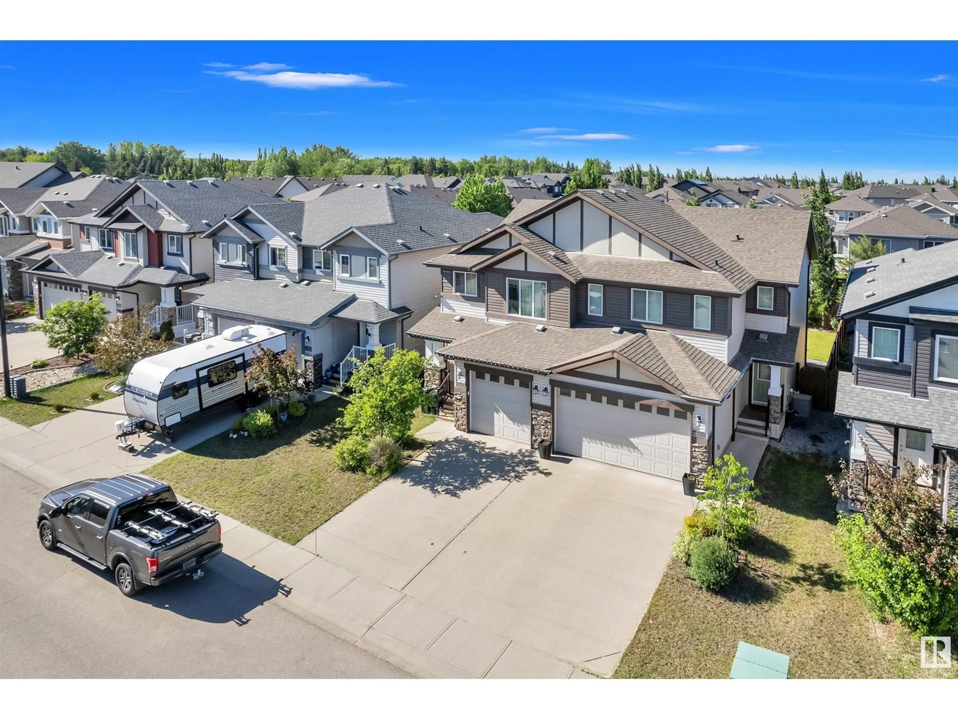 A pic from outside/outdoor area/front of a property/back of a property/a pic from drone, street for 20212 43 AV, Edmonton Alberta T6M0R8