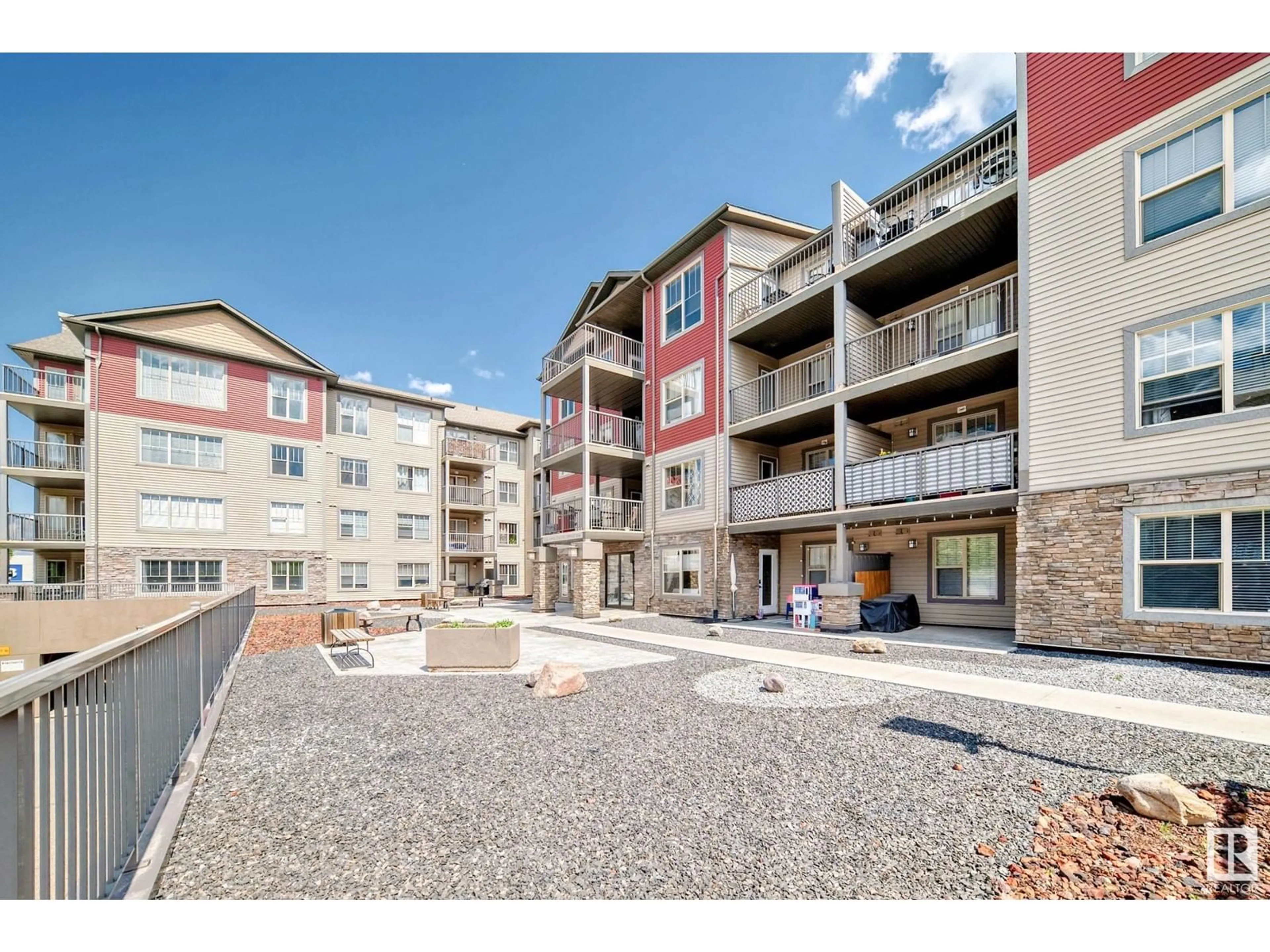 A pic from outside/outdoor area/front of a property/back of a property/a pic from drone, building for #307 - 105 AMBLESIDE DR, Edmonton Alberta T6W0J4