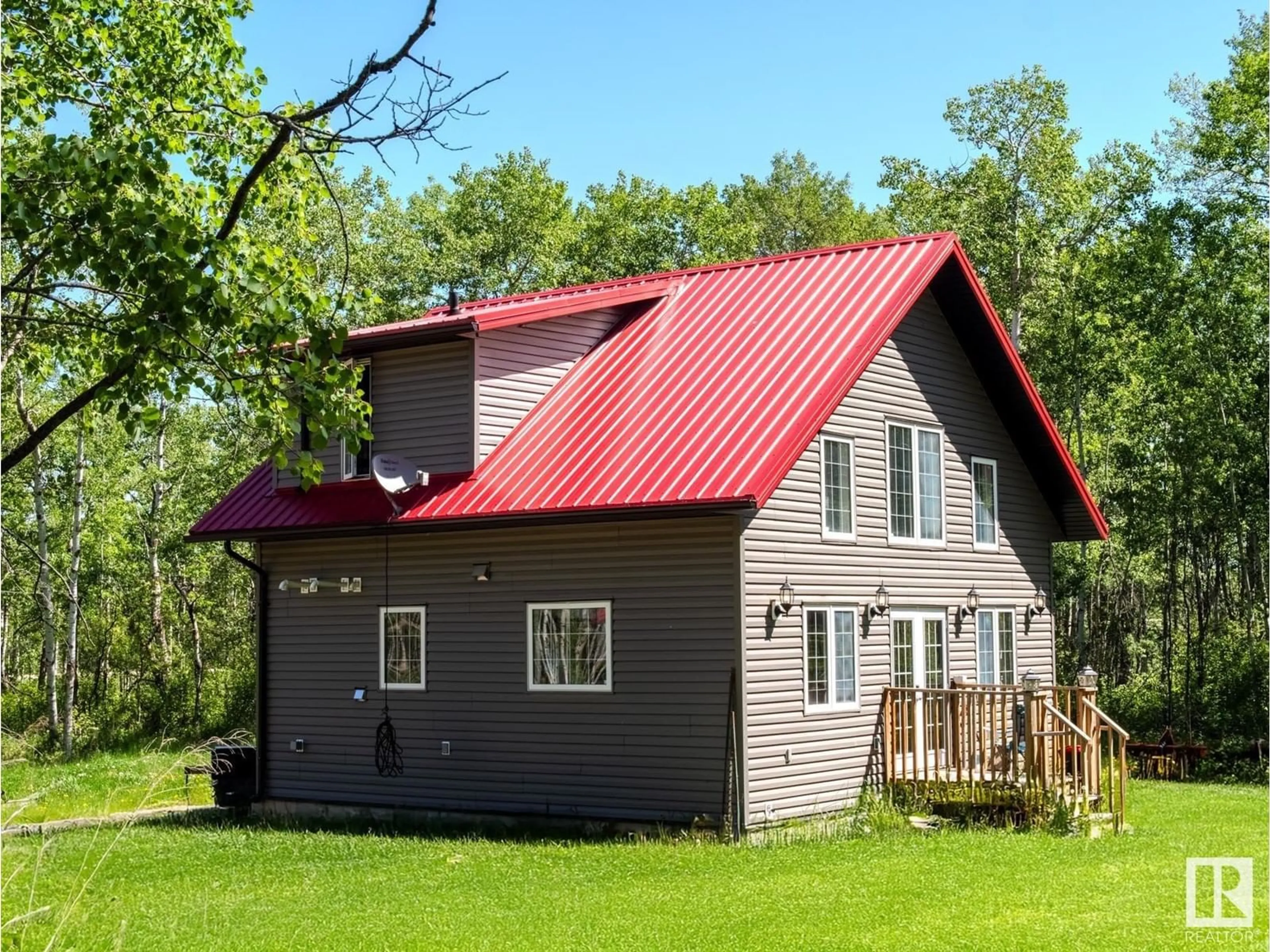 Home with vinyl exterior material, building for 20231 TWP RD 500, Rural Camrose County Alberta T0B2M1