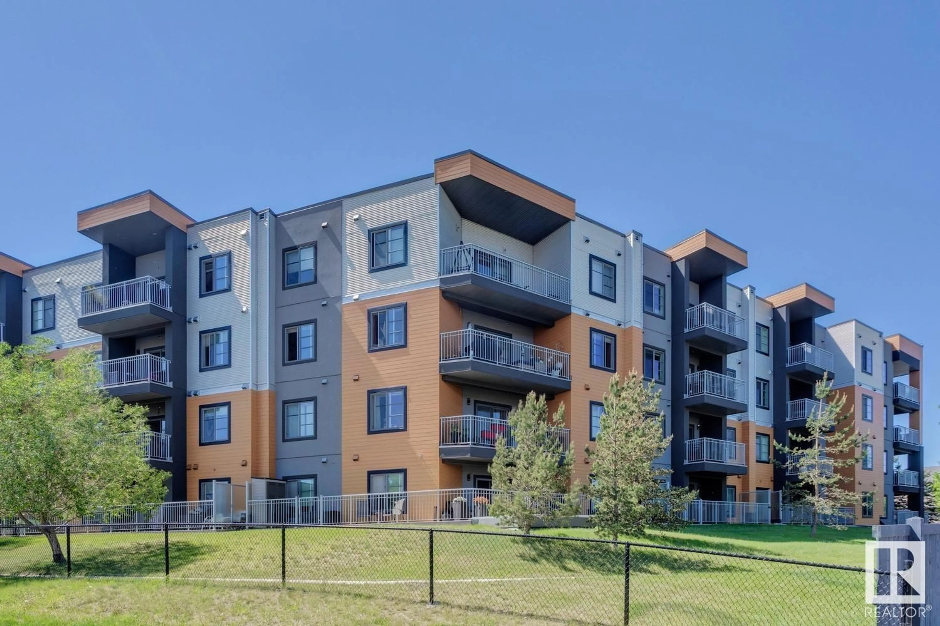 A pic from outside/outdoor area/front of a property/back of a property/a pic from drone, building for #104 - 507 ALBANY WY, Edmonton Alberta T6V0L9