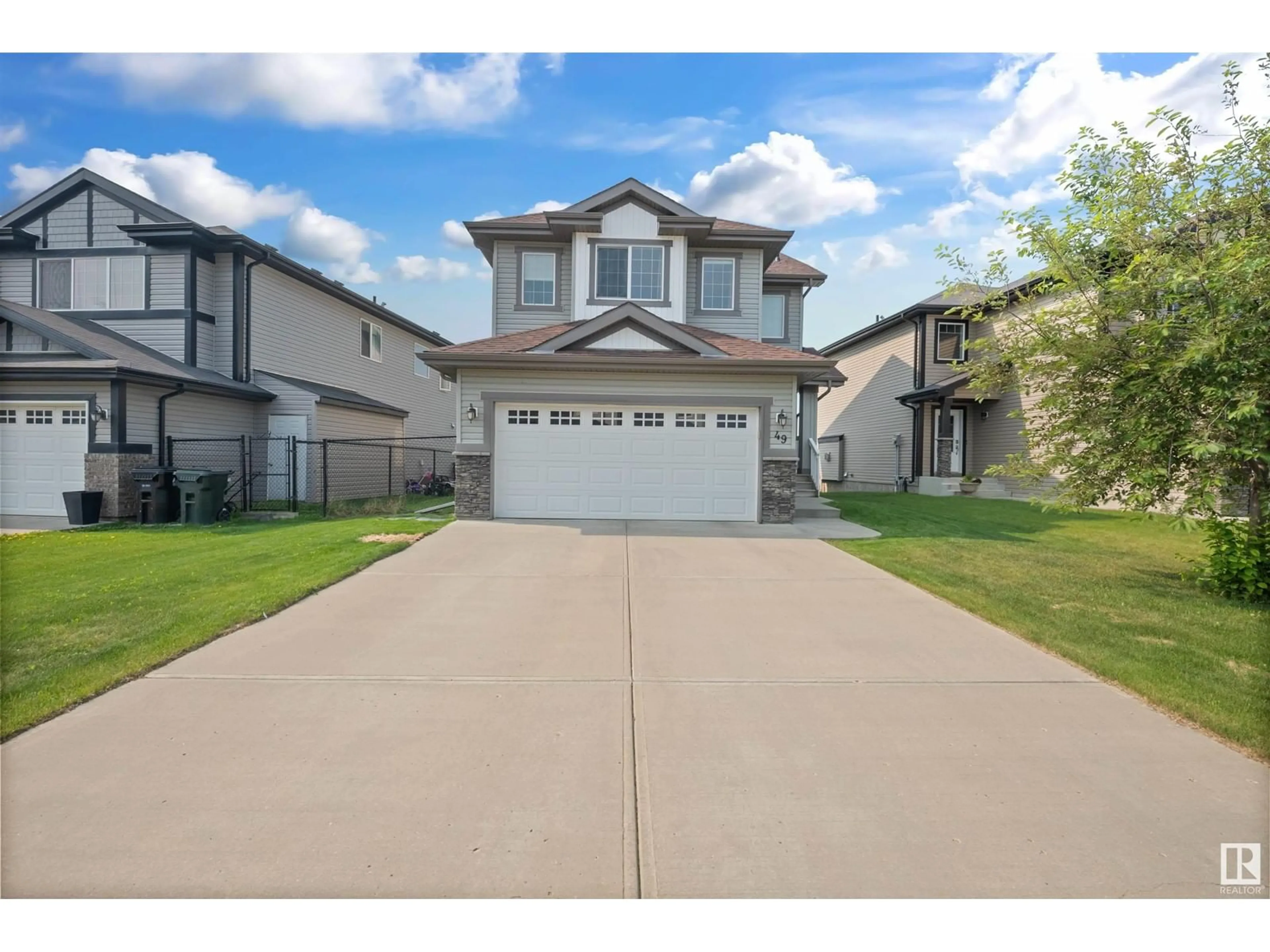 Home with vinyl exterior material, street for 49 SPRUCE RIDGE DR, Spruce Grove Alberta T7X4M8