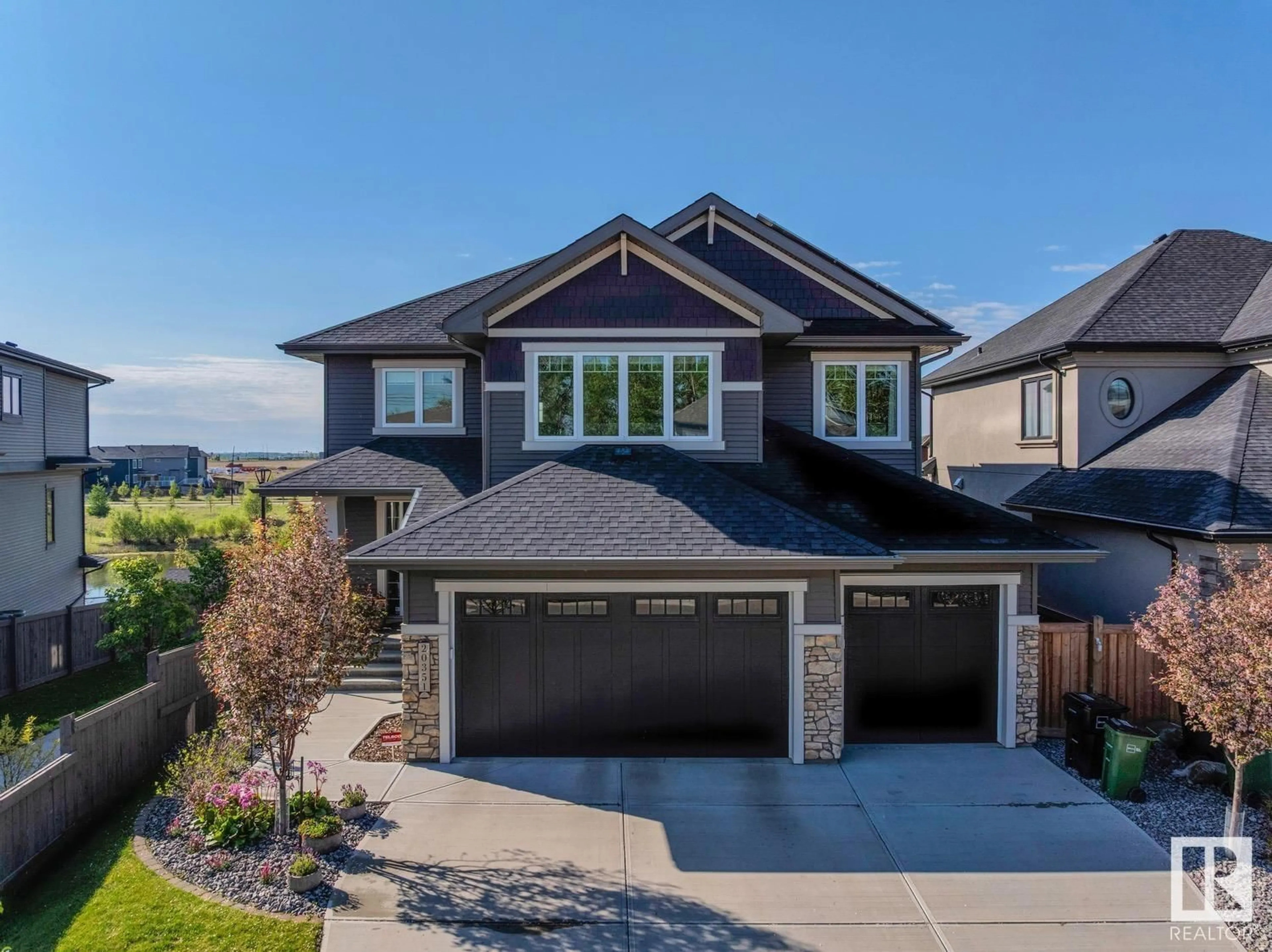 Home with vinyl exterior material, street for 20351 29 AV, Edmonton Alberta T6M0W5