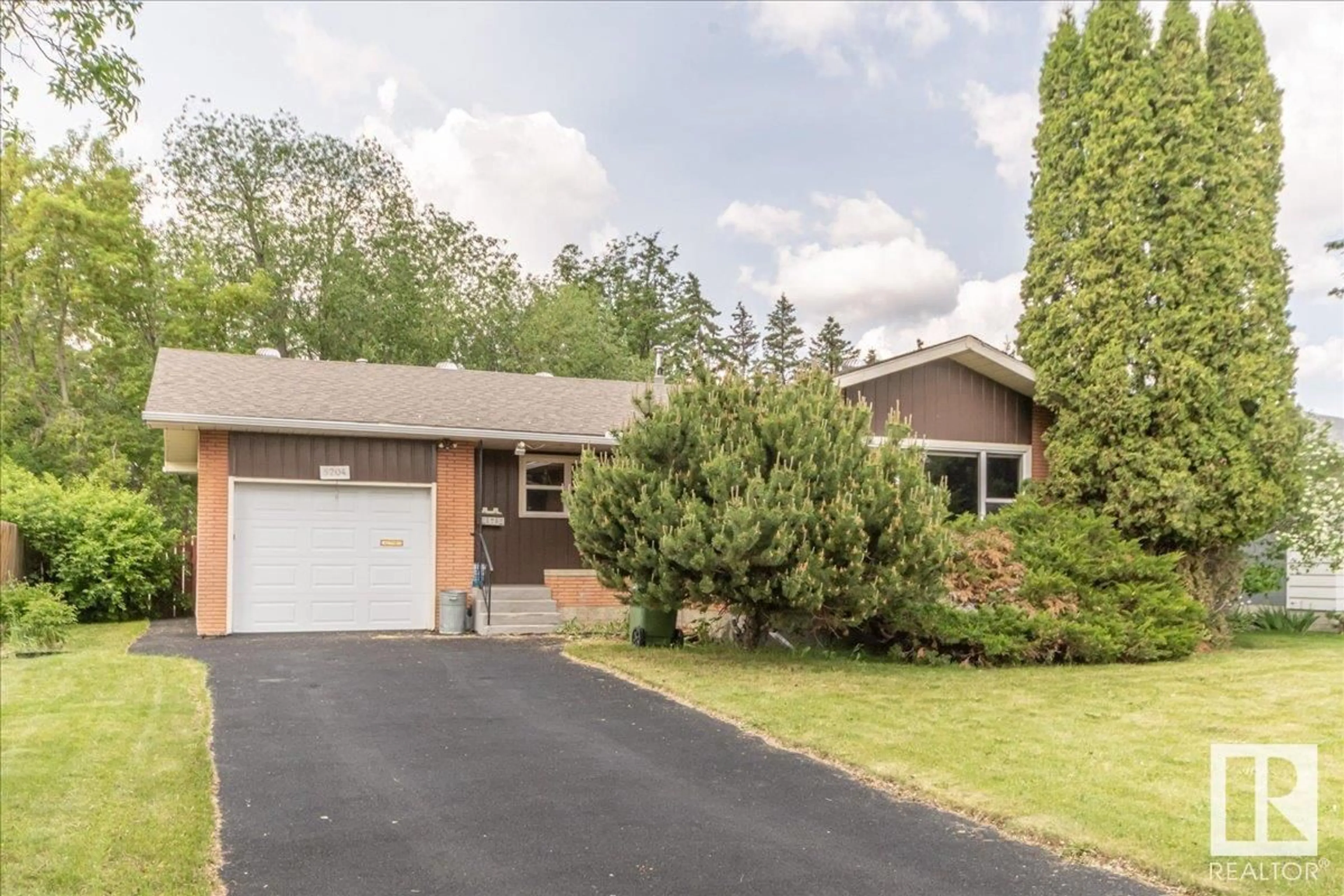 Home with brick exterior material, street for 5204 55A ST, Wetaskiwin Alberta T9A1T9