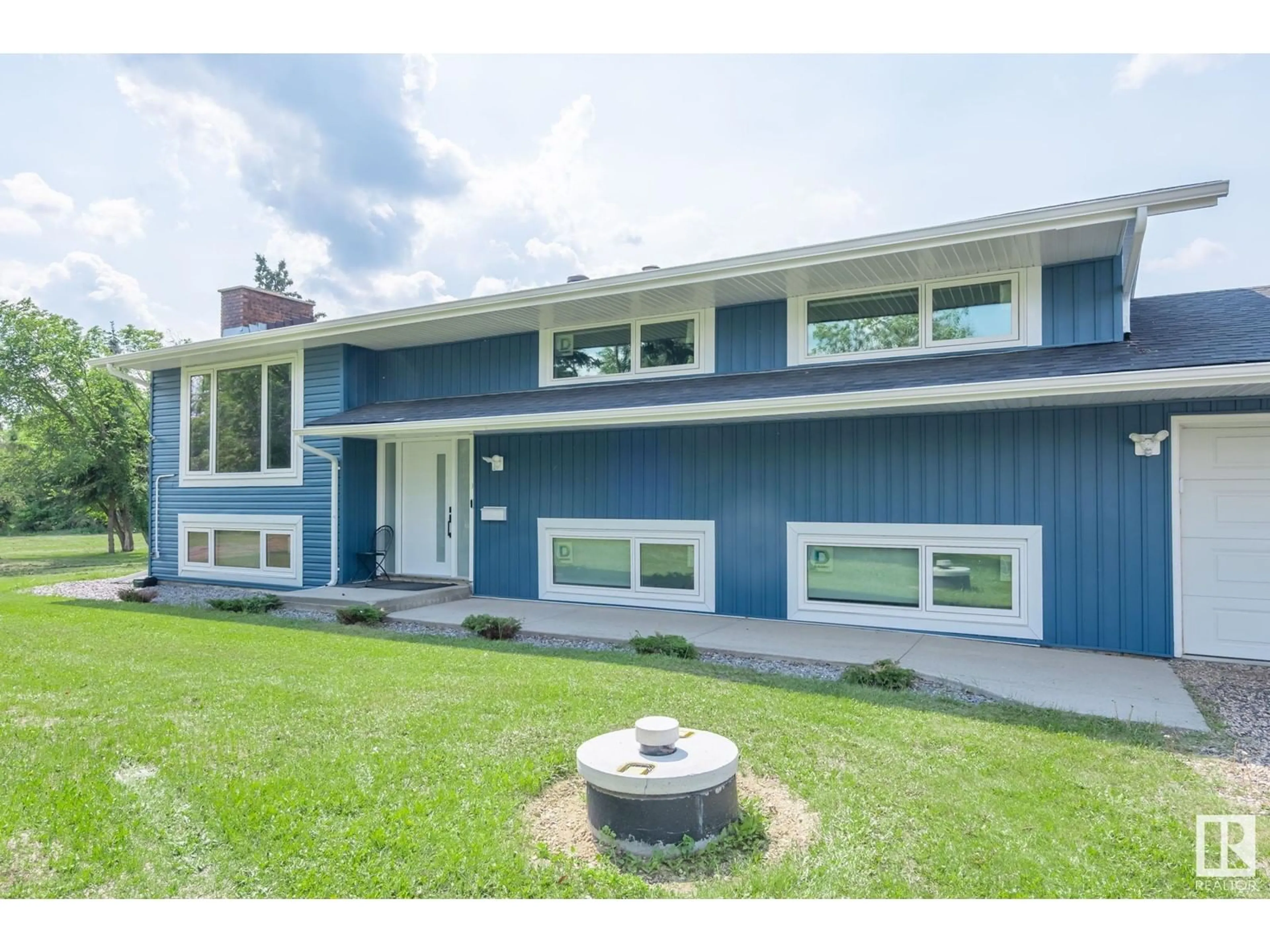 Home with vinyl exterior material, street for 253 22550 TWP RD 522, Rural Strathcona County Alberta T8B1G8