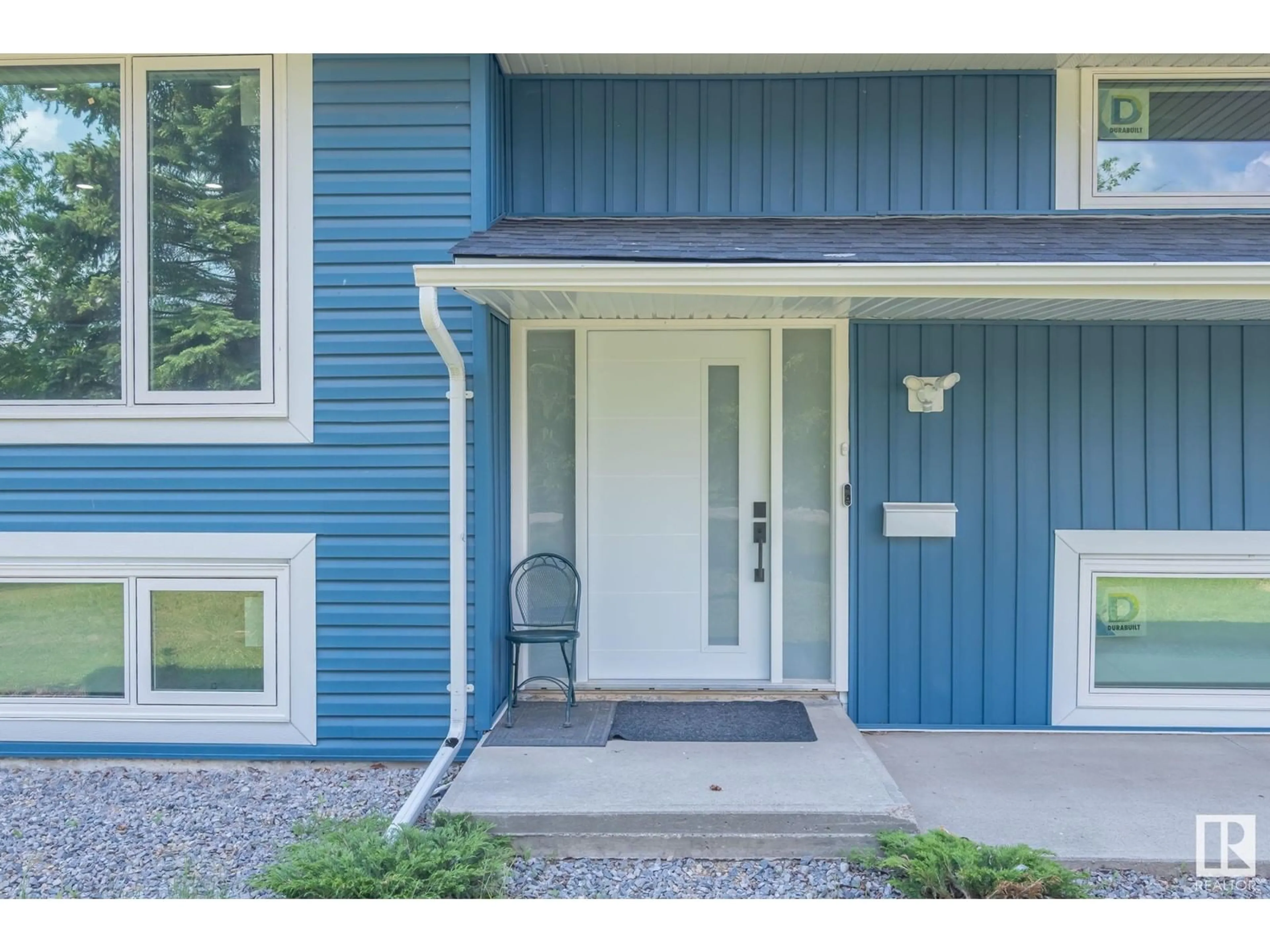 Home with vinyl exterior material, street for 253 22550 TWP RD 522, Rural Strathcona County Alberta T8B1G8
