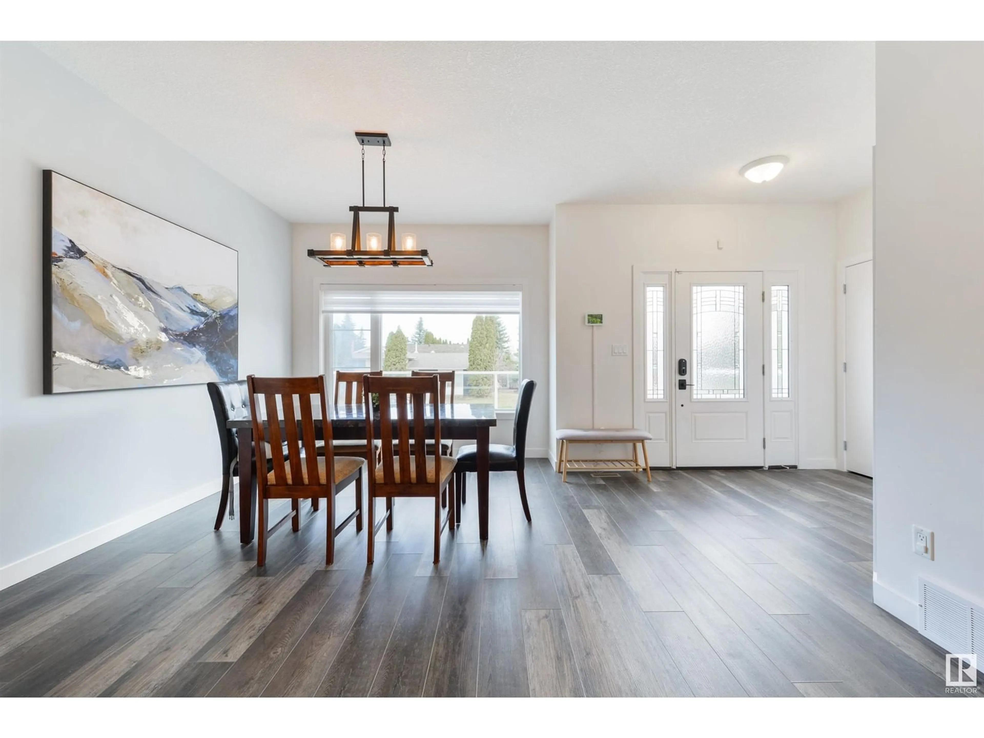 Dining room, wood/laminate floor for 11511 24 AV, Edmonton Alberta T6J3R6